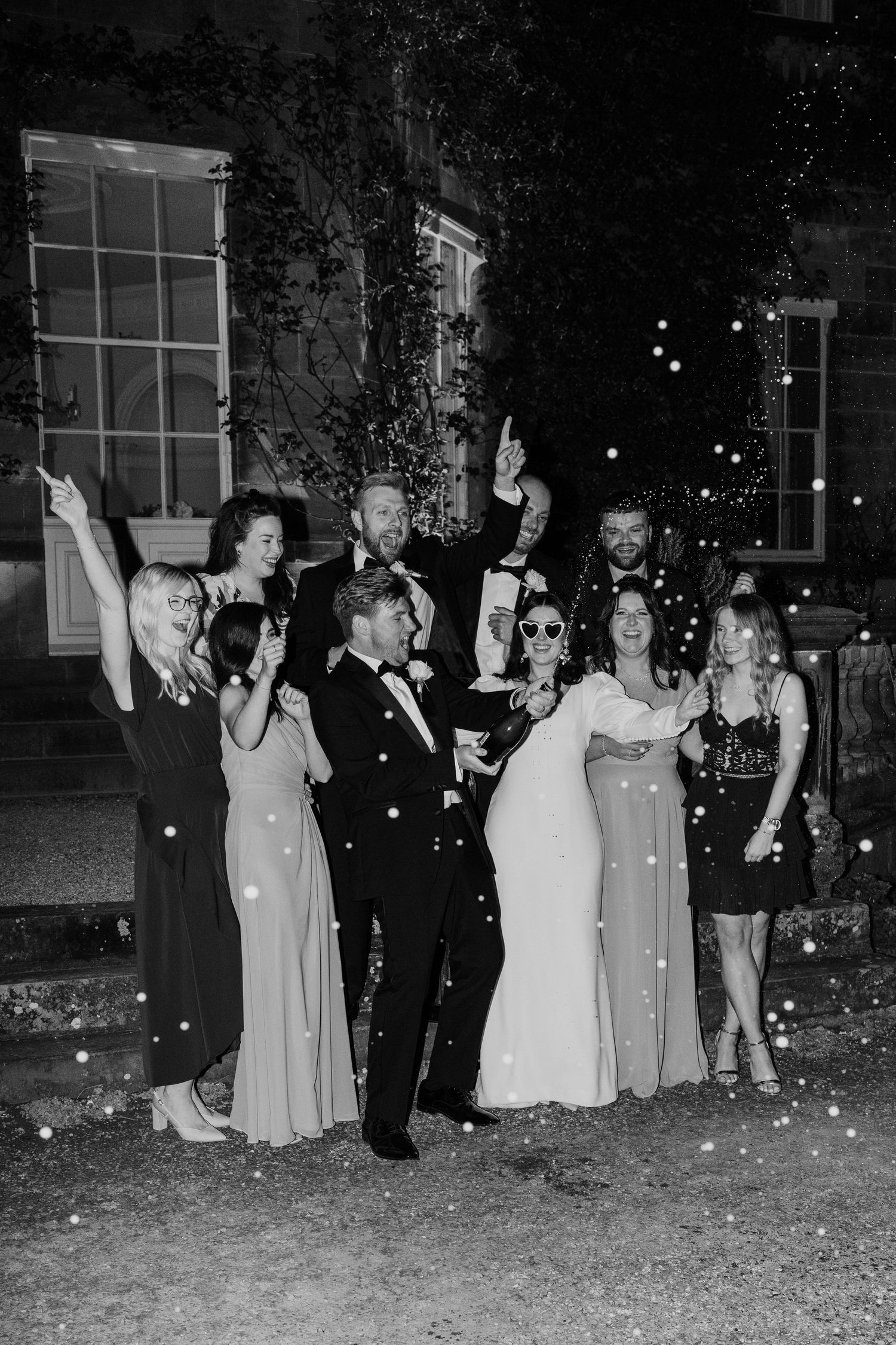 Champagne spray with friends and family at Middleton Lodge Main House.