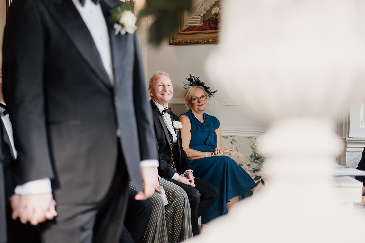 Guests laughing and smiling during the intimate wedding ceremony at The Main House, Middleton Lodge.