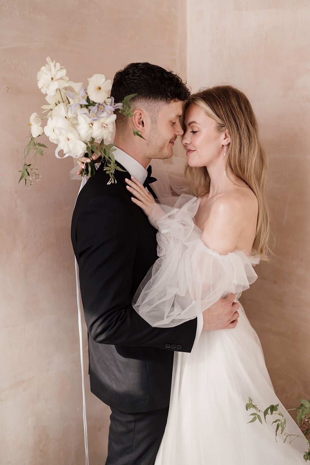 A couple smiling during their wedding in Ibiza.