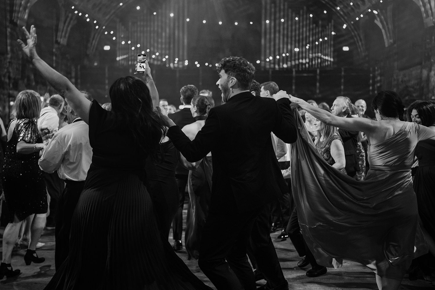 Guests dancing and performing during the hora at Battersea Arts Centre.