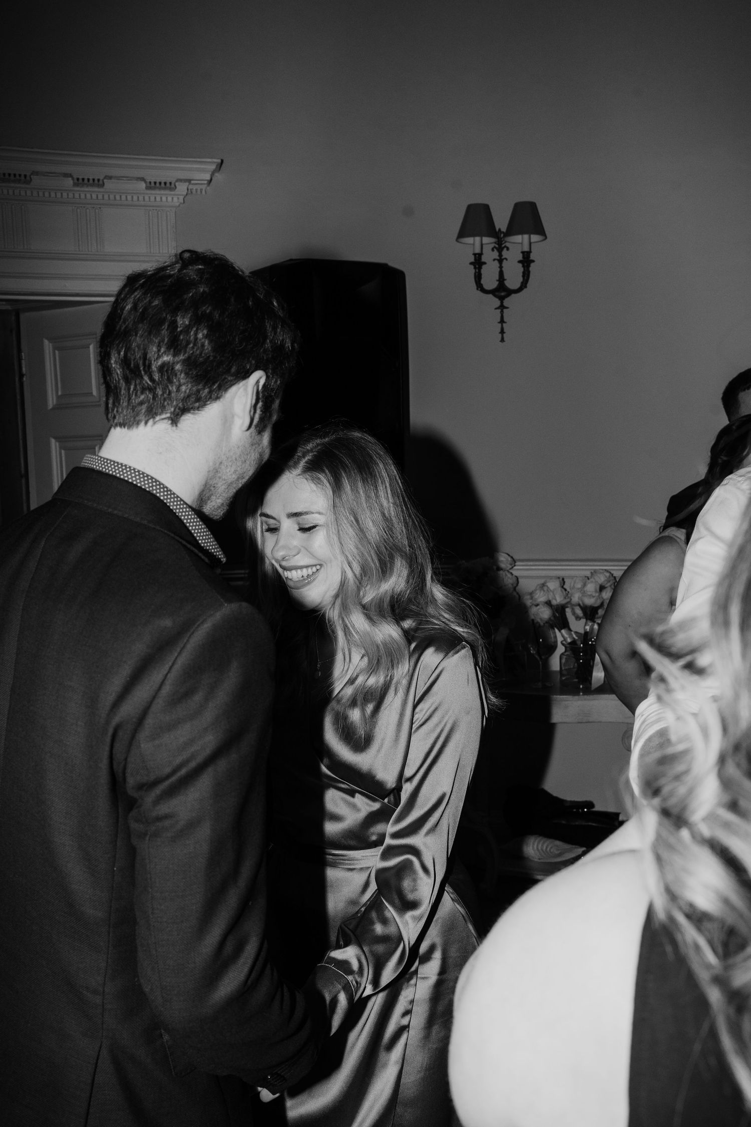Friends dancing during their first dance at Middleton Lodge Estate.