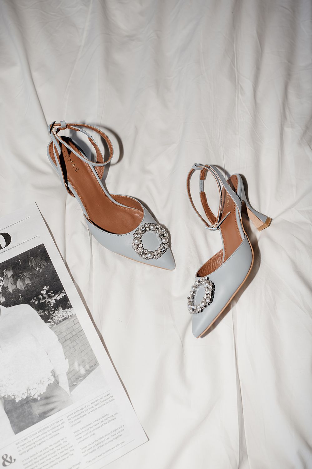 Chic editorial bridal details using direct flash in London.