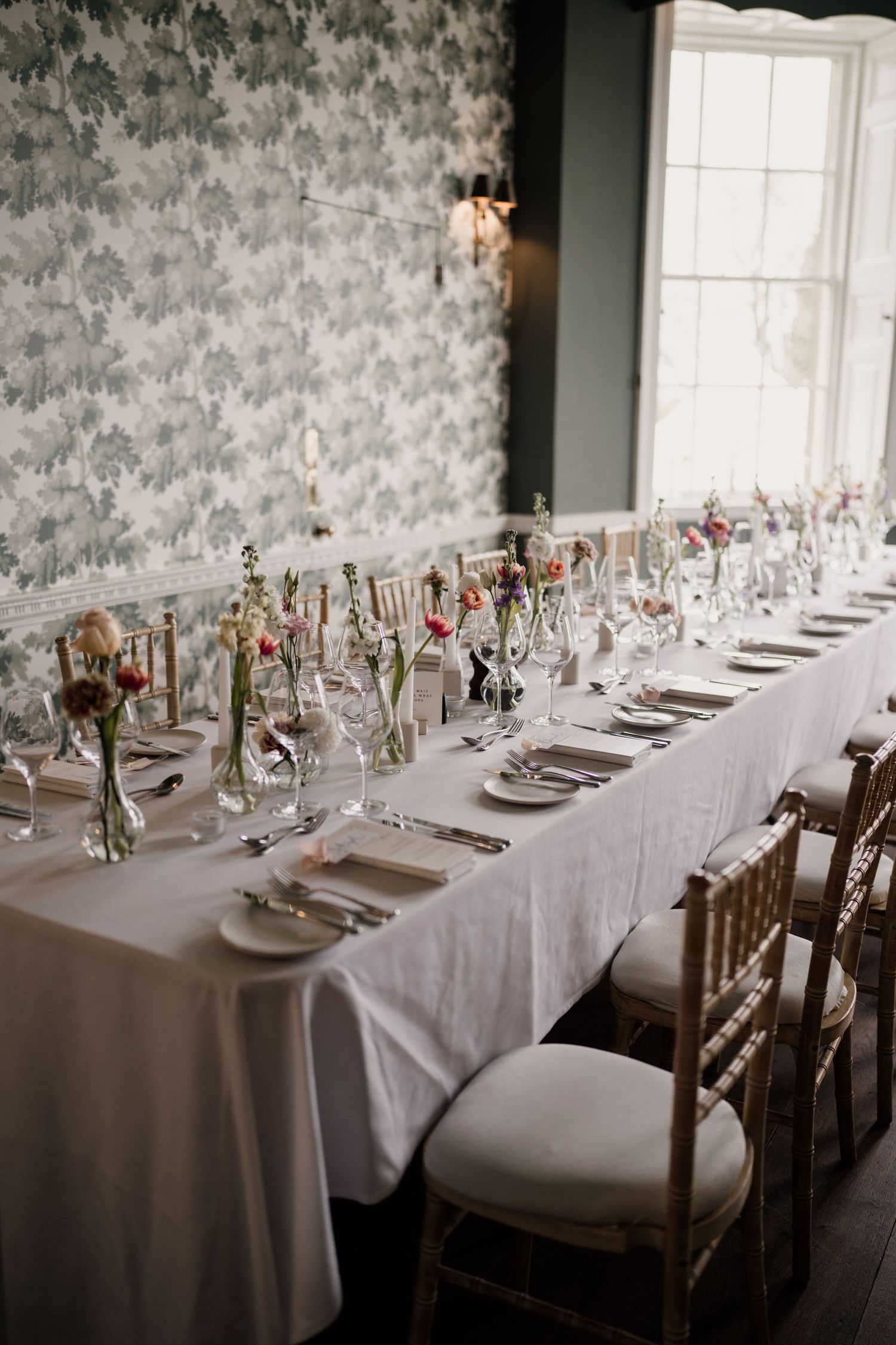 Photograph of the banquet tables styled with flowers and stationery at middleton lodge.