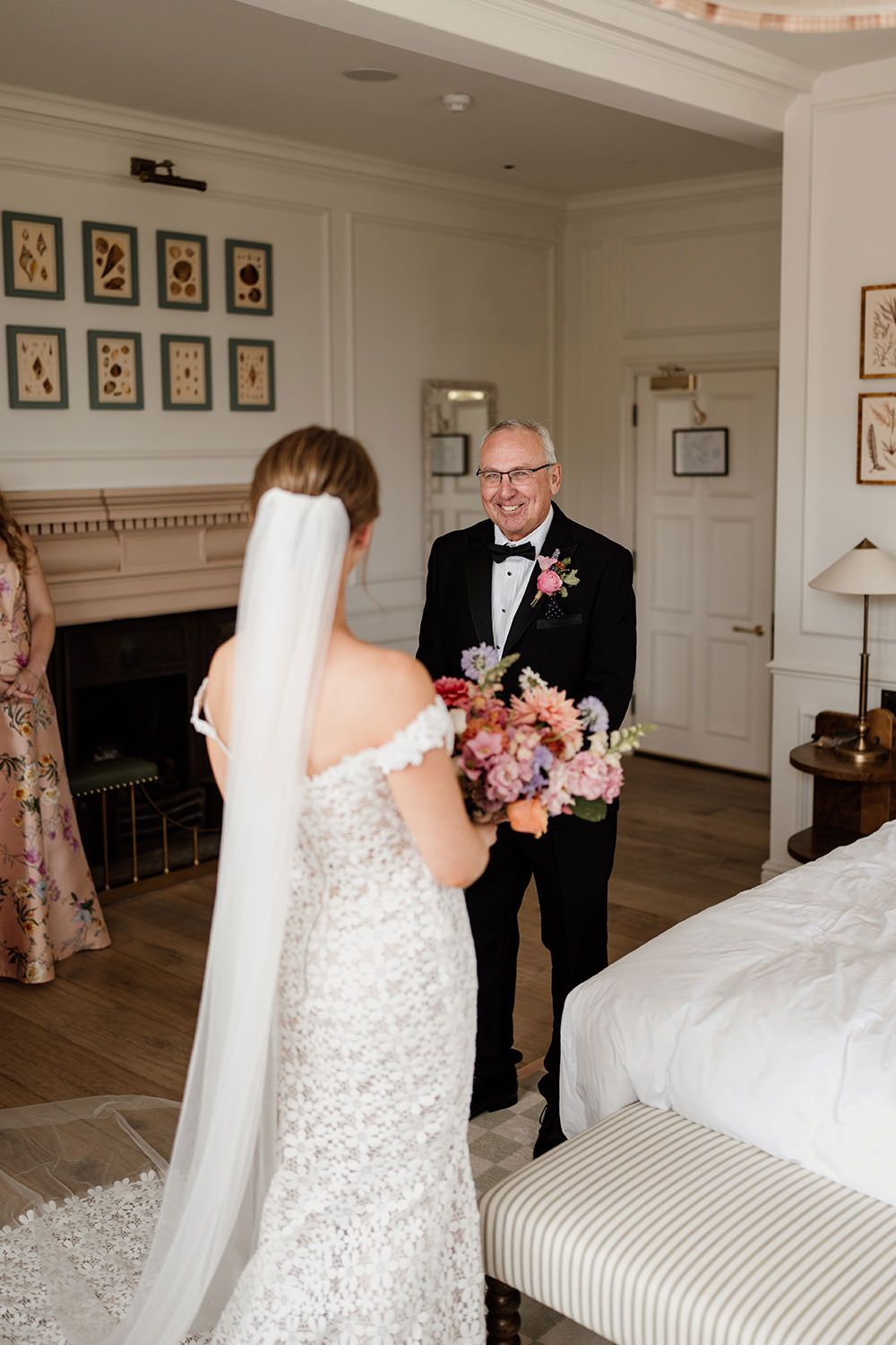Father of the bride sees his daughter for the first time on her wedding day.
