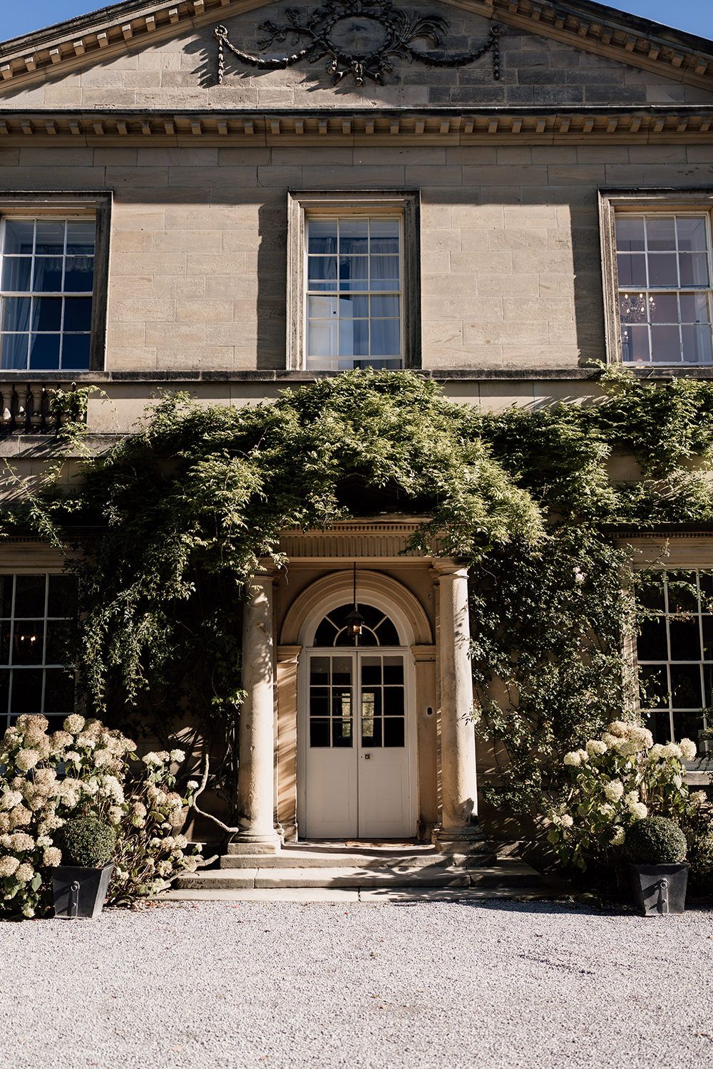 Intimate ceremony in the Main House at Middleton Lodge, with soft natural light and elegant floral styling.