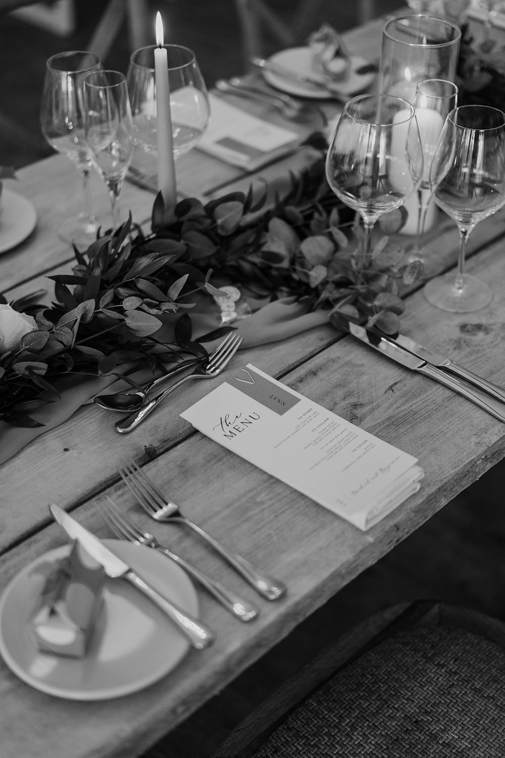 Detail in black and white of wedding guests personalised stationery.