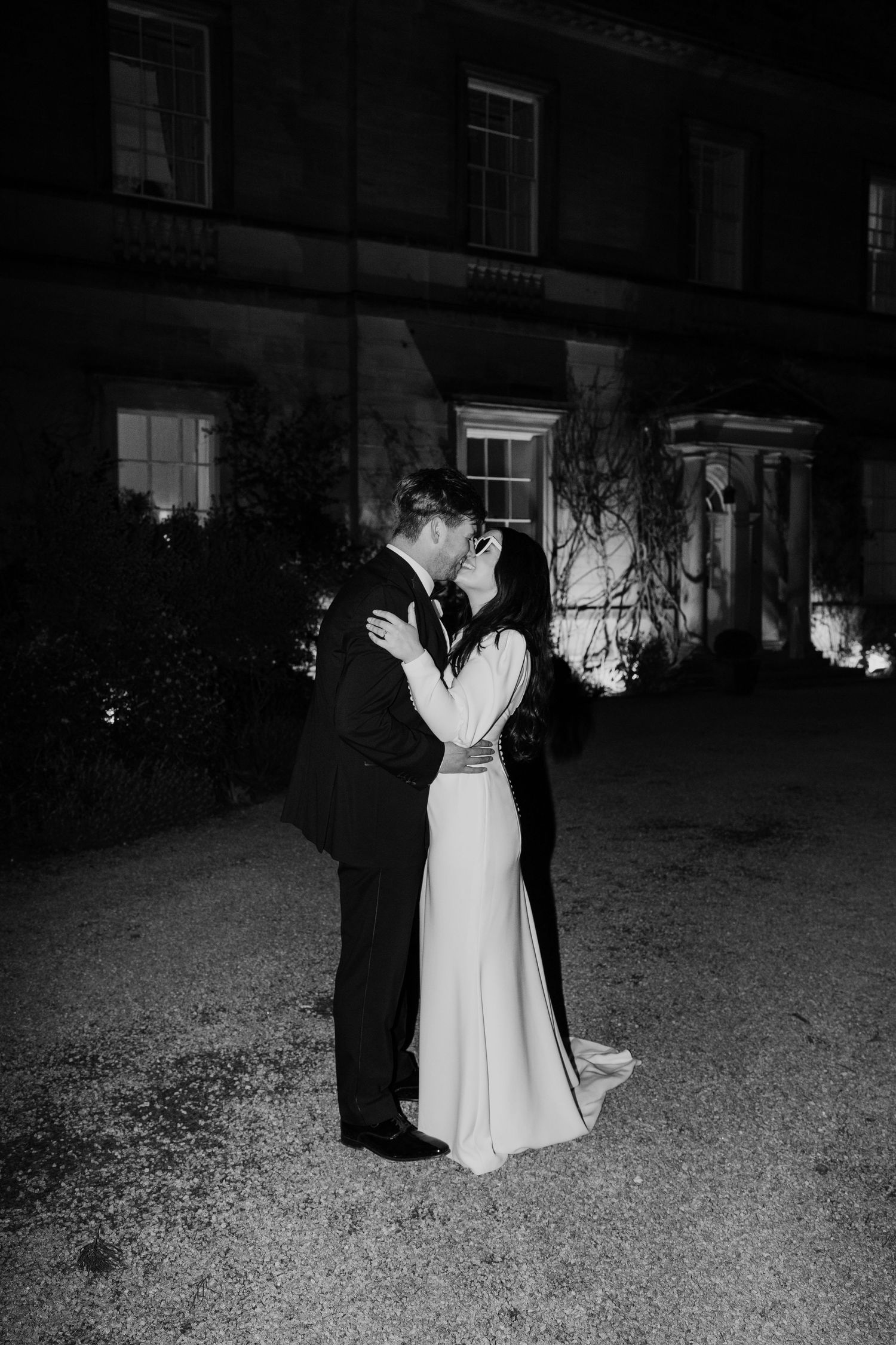 Flash couples portraits at Middleton Lodge Estate with the couple kissing.