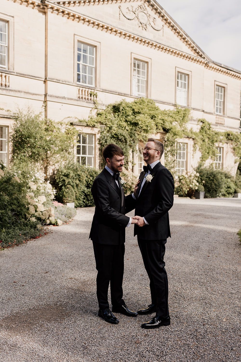 The newlyweds walking hand in hand through the estate’s gardens, making the most of golden hour.
