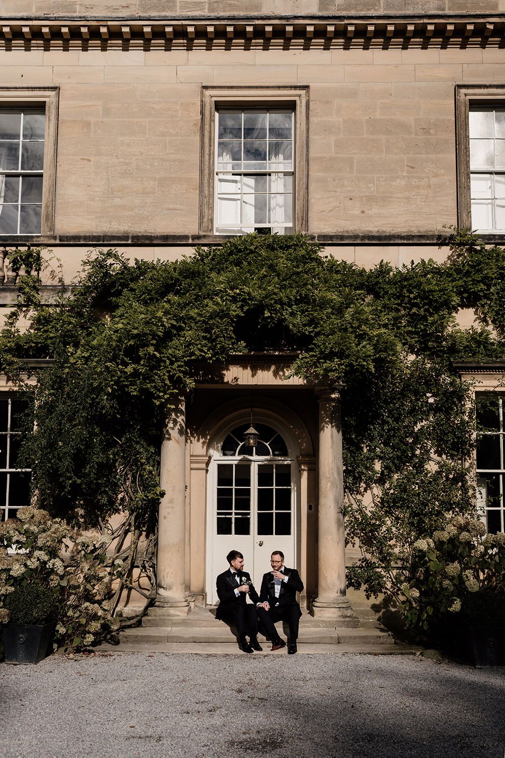 Romantic editorial wedding portraits of the couple framed by the estate’s historic architecture.