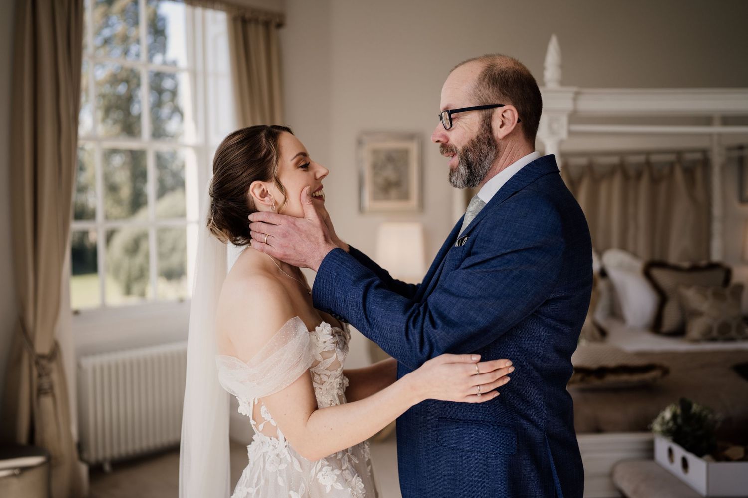 Brides dad talking to his daughter on their wedding morning.
