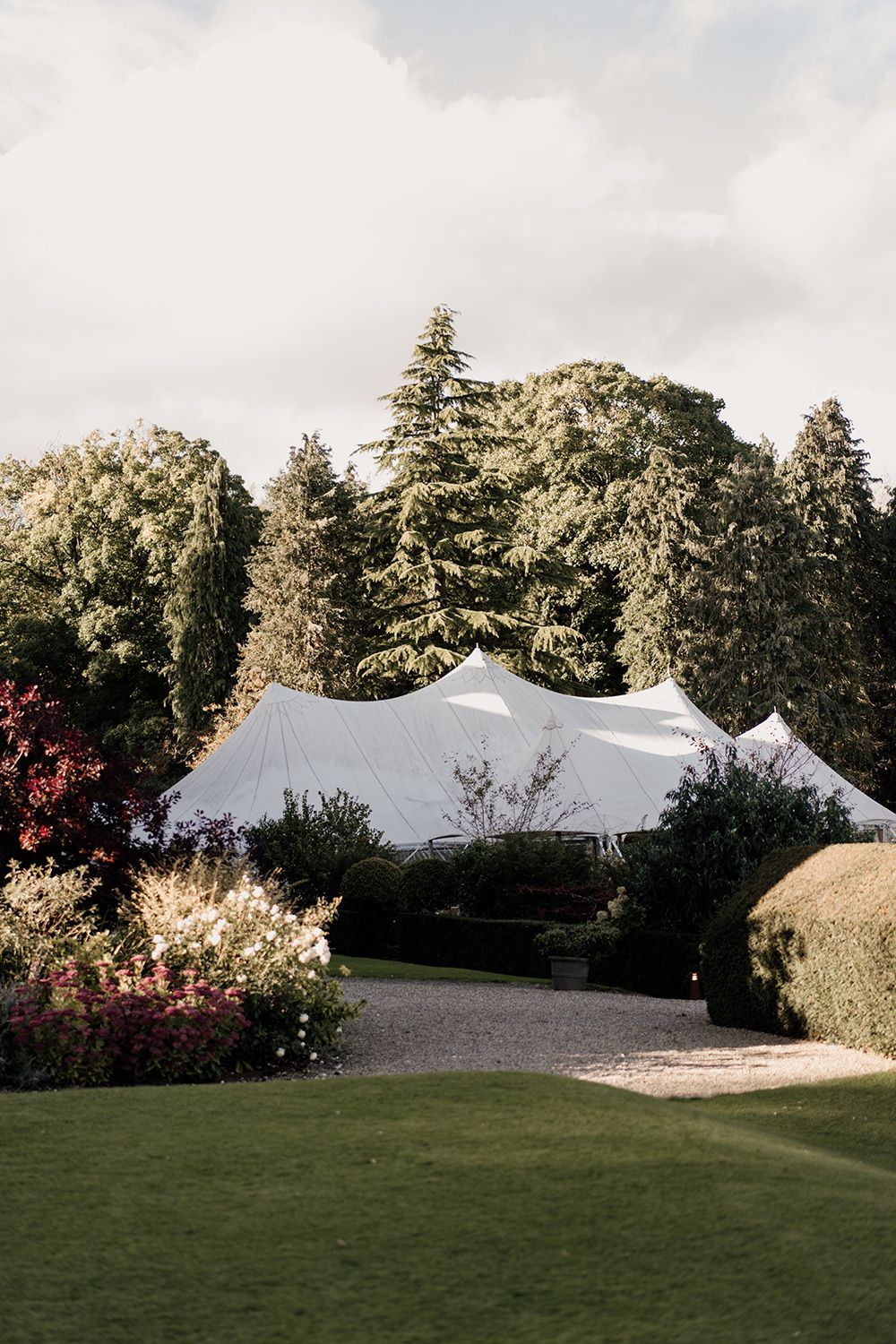 Marquee nestled in the gardens at Luxury UK Wedding Venue Middleton Lodge Estate.