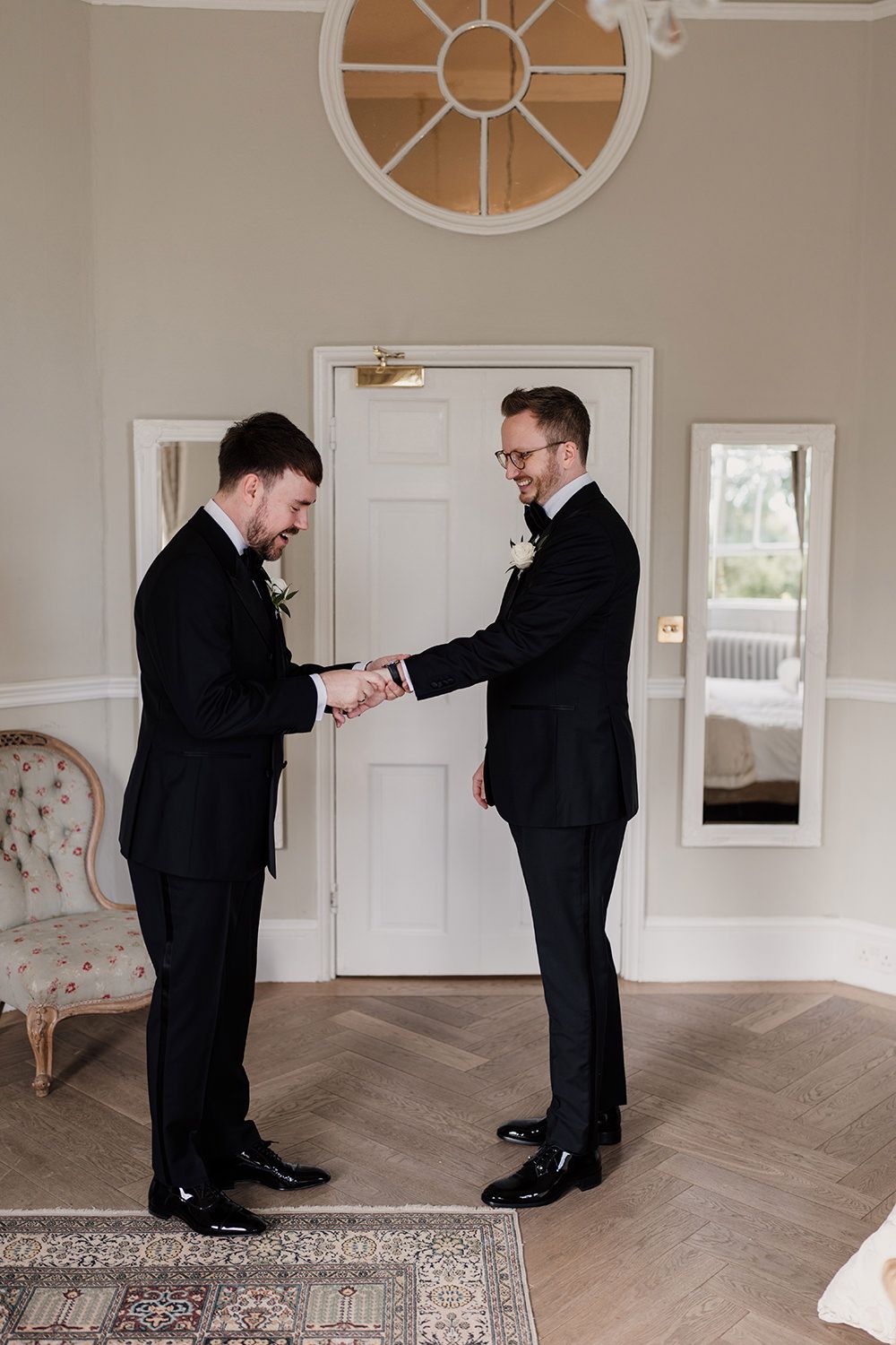 Grooms first look at each other on their wedding day at Middleton Lodge Estate.