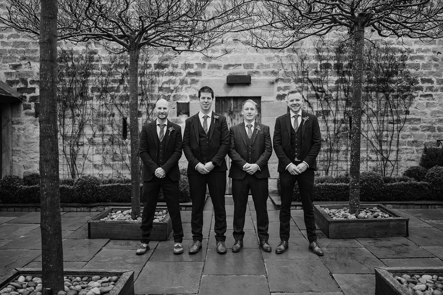 Groom and his groomsmen at healey barn.