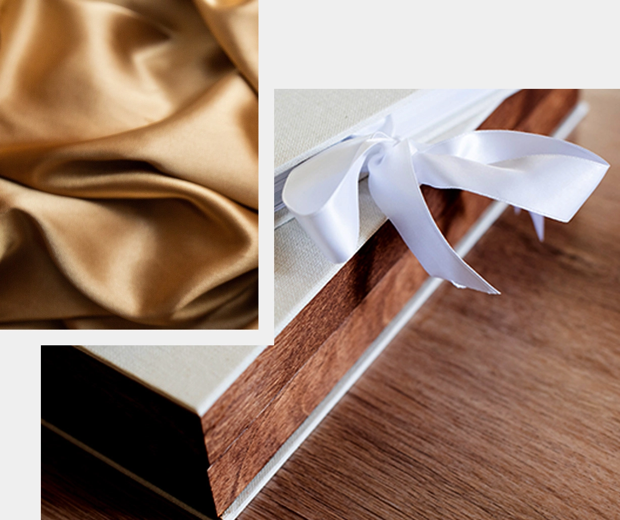 Elegant gift box with white satin ribbon bow on walnut wood surface, beside luxurious golden silk fabric.