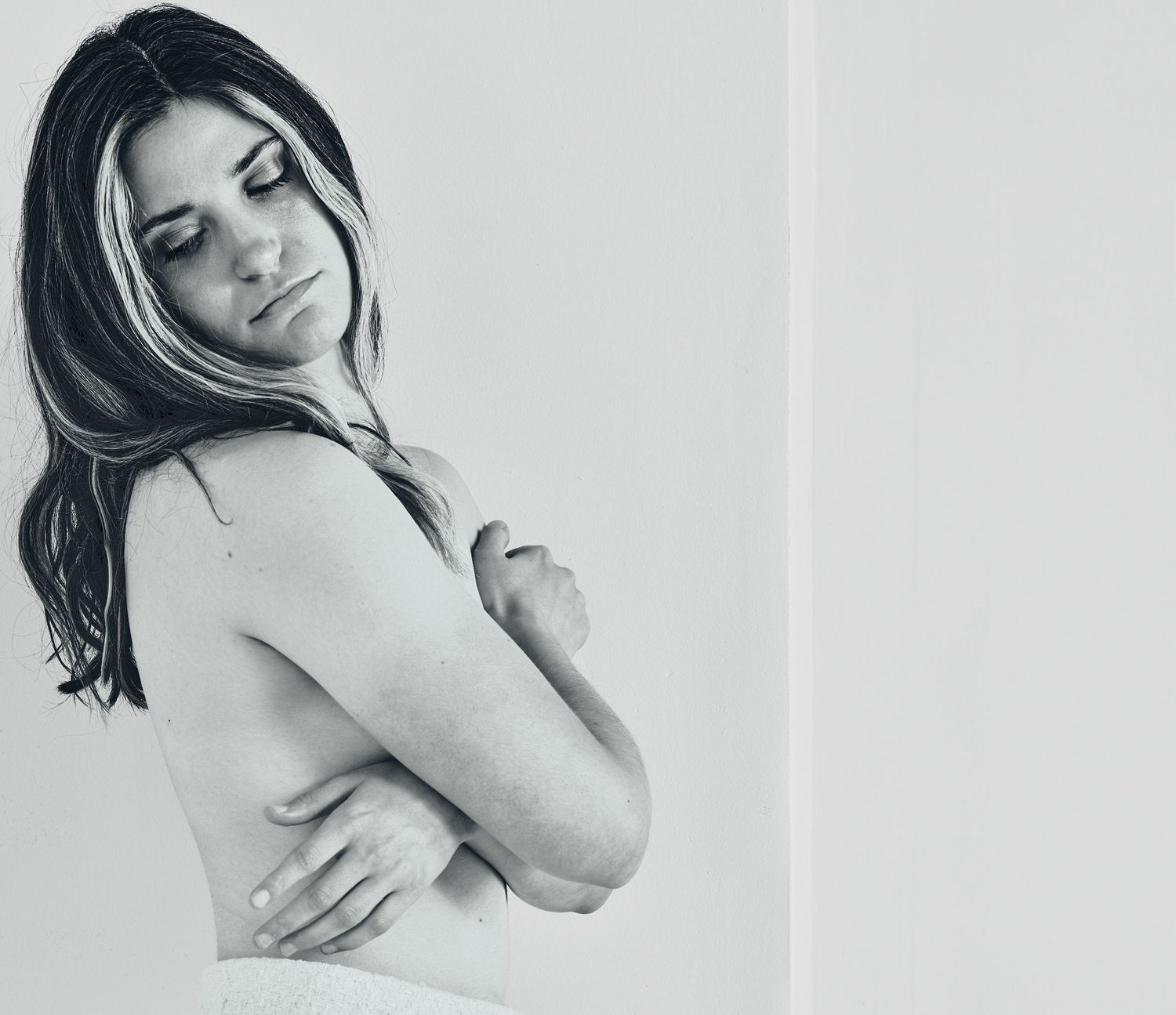 Monochromatic portrait sequence showing intimate and emotional poses from a classic black and white photoshoot.