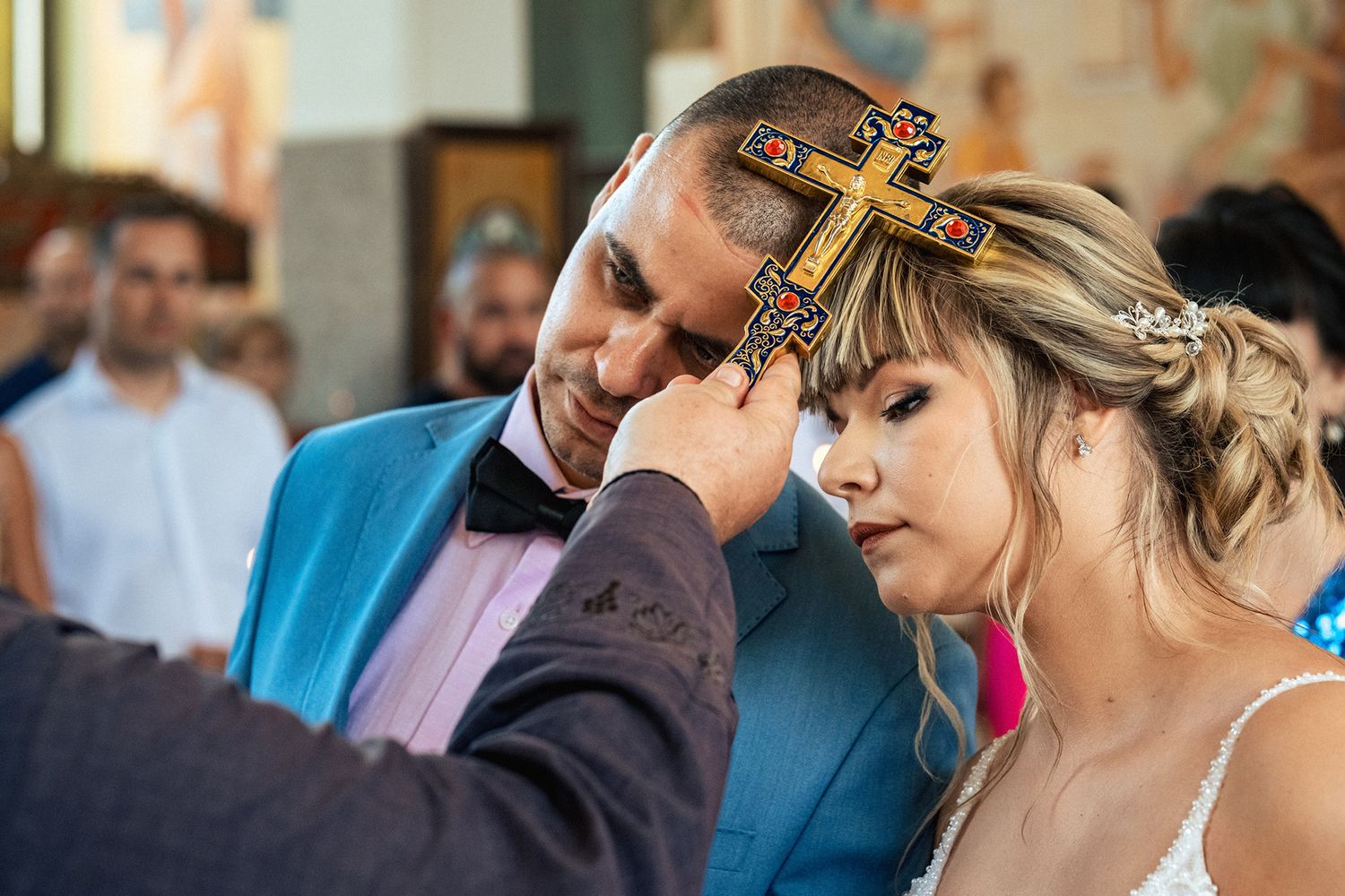 Wedding party getting ready with hair and makeup preparations indoors.