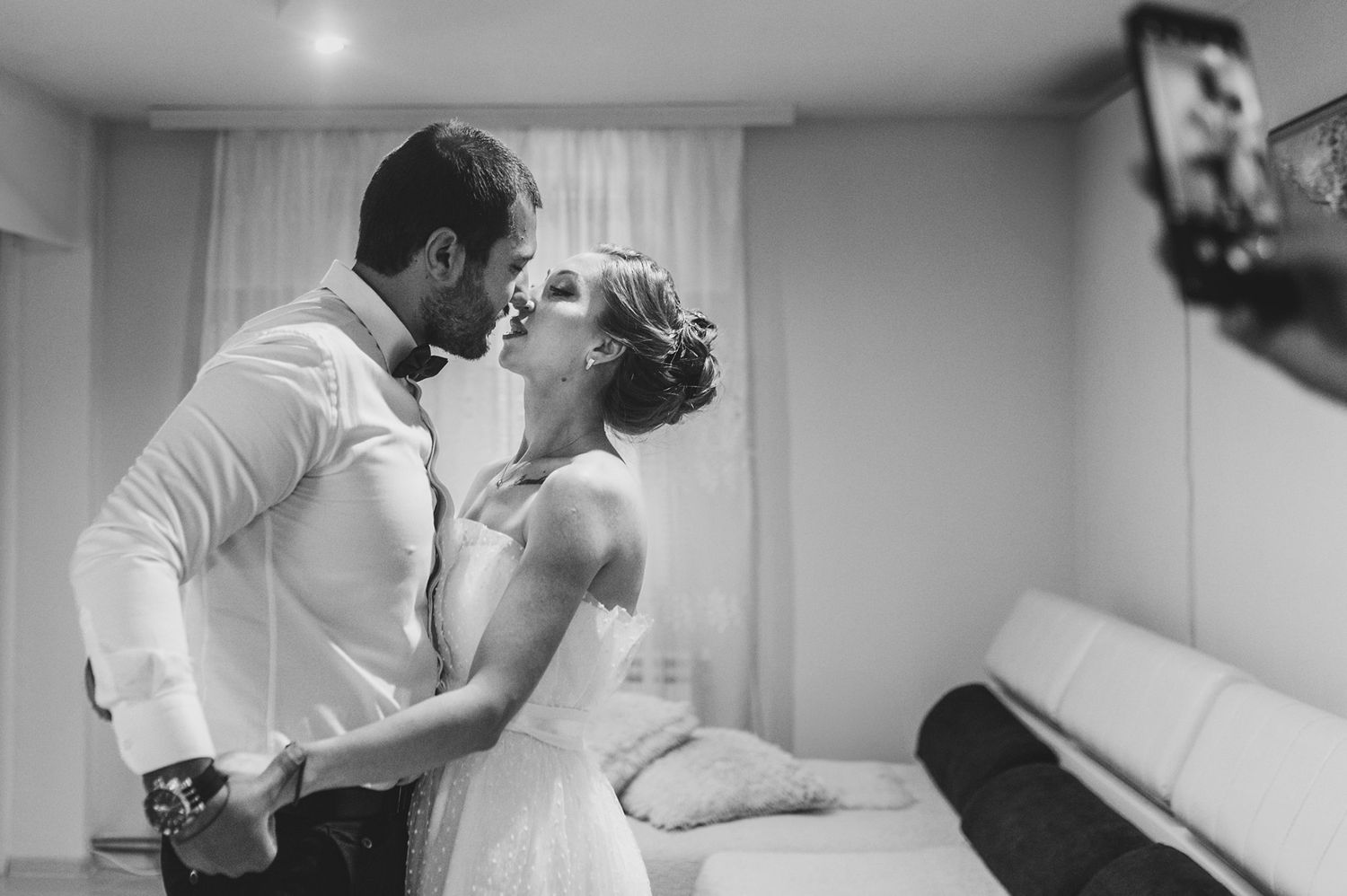 Intimate wedding moments captured in black and white photography.