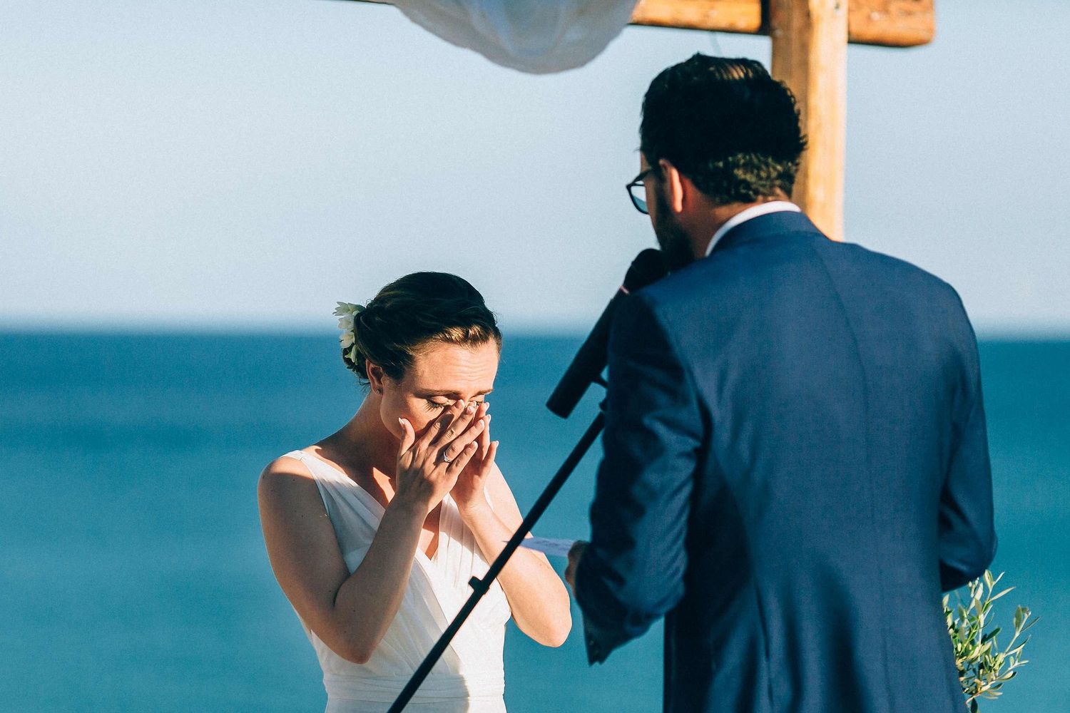 Close-up of the bride’s emotional reaction and tears during a heartfelt moment
