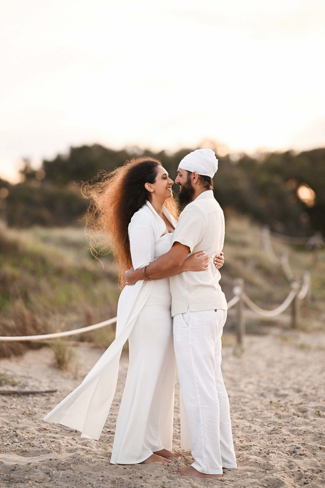 Happy woman laughing after a surprise marriage proposal she never expected - emotional proposal video and photo session in Valencia