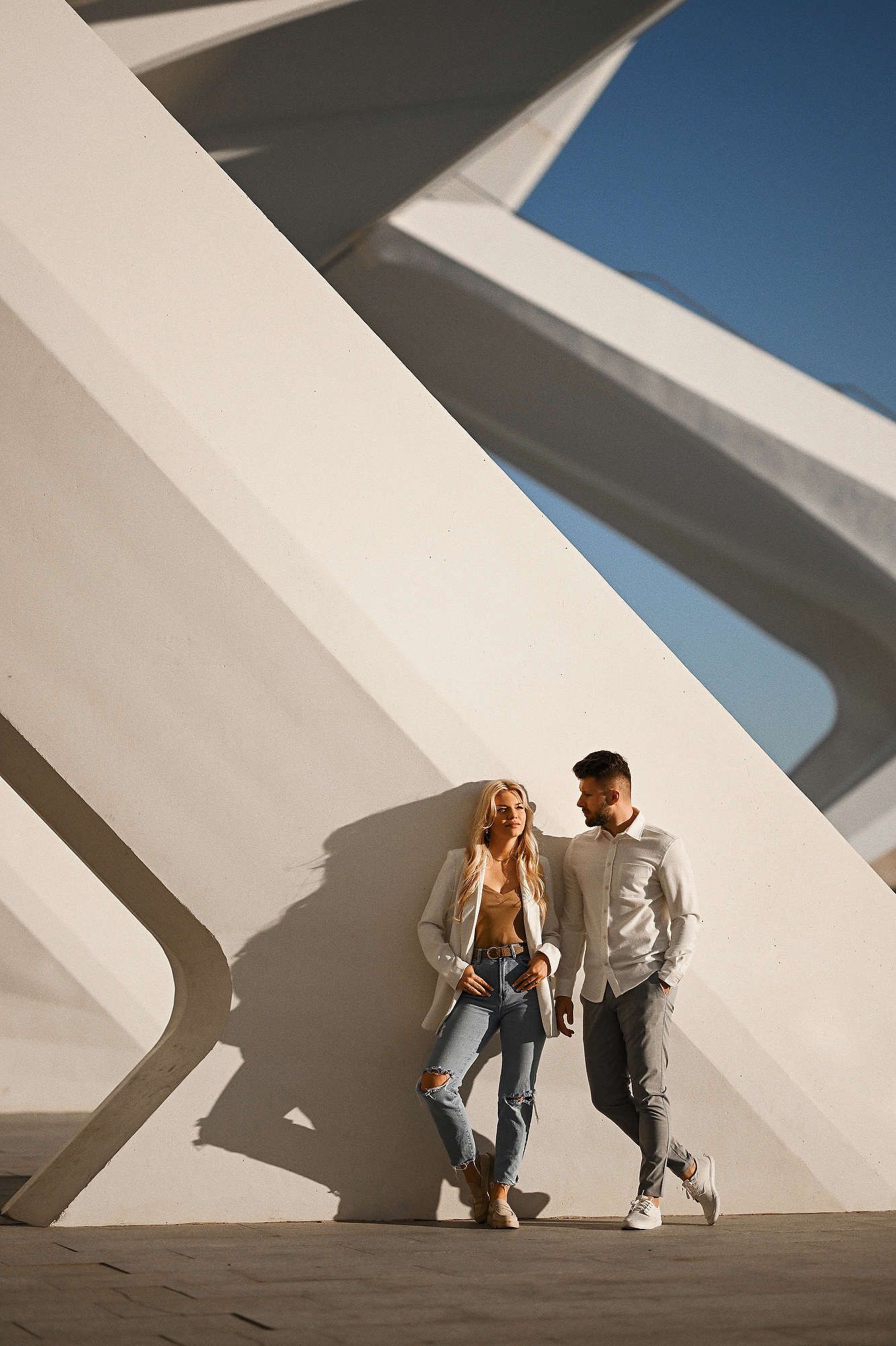 Romantic couple's walk at the City of Arts and Sciences for a documentary-style engagement session