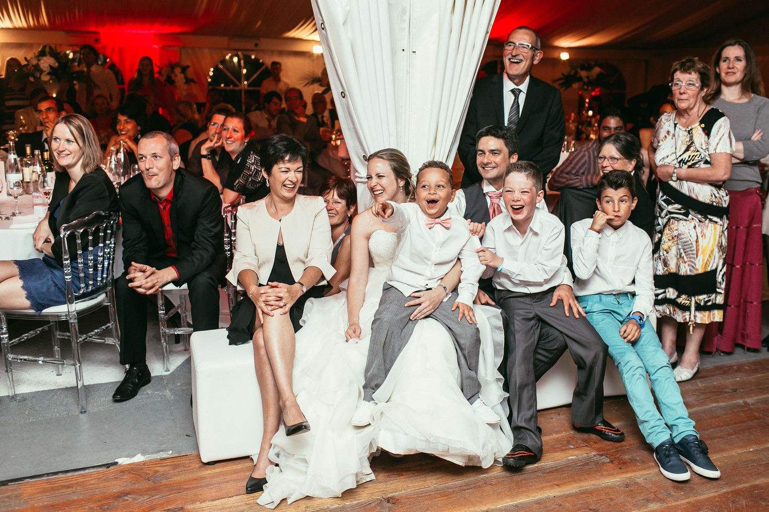 Lively wedding reception at Château de Changy. Dynamic party photography with a high-fashion editorial vibe