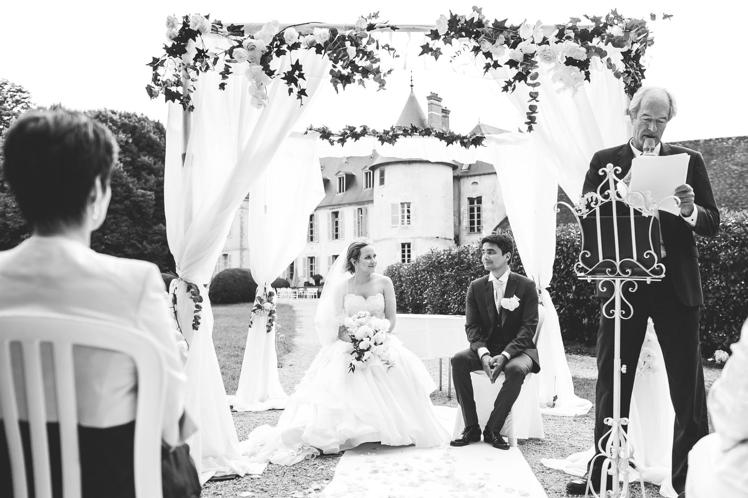 Romantic couple moments after the ceremony at Château de Changy. Elegant movement and genuine emotions.
