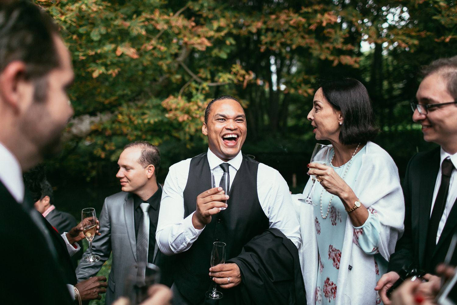 Lively wedding reception at Château de Changy. Dynamic party photography with a high-fashion editorial vibe