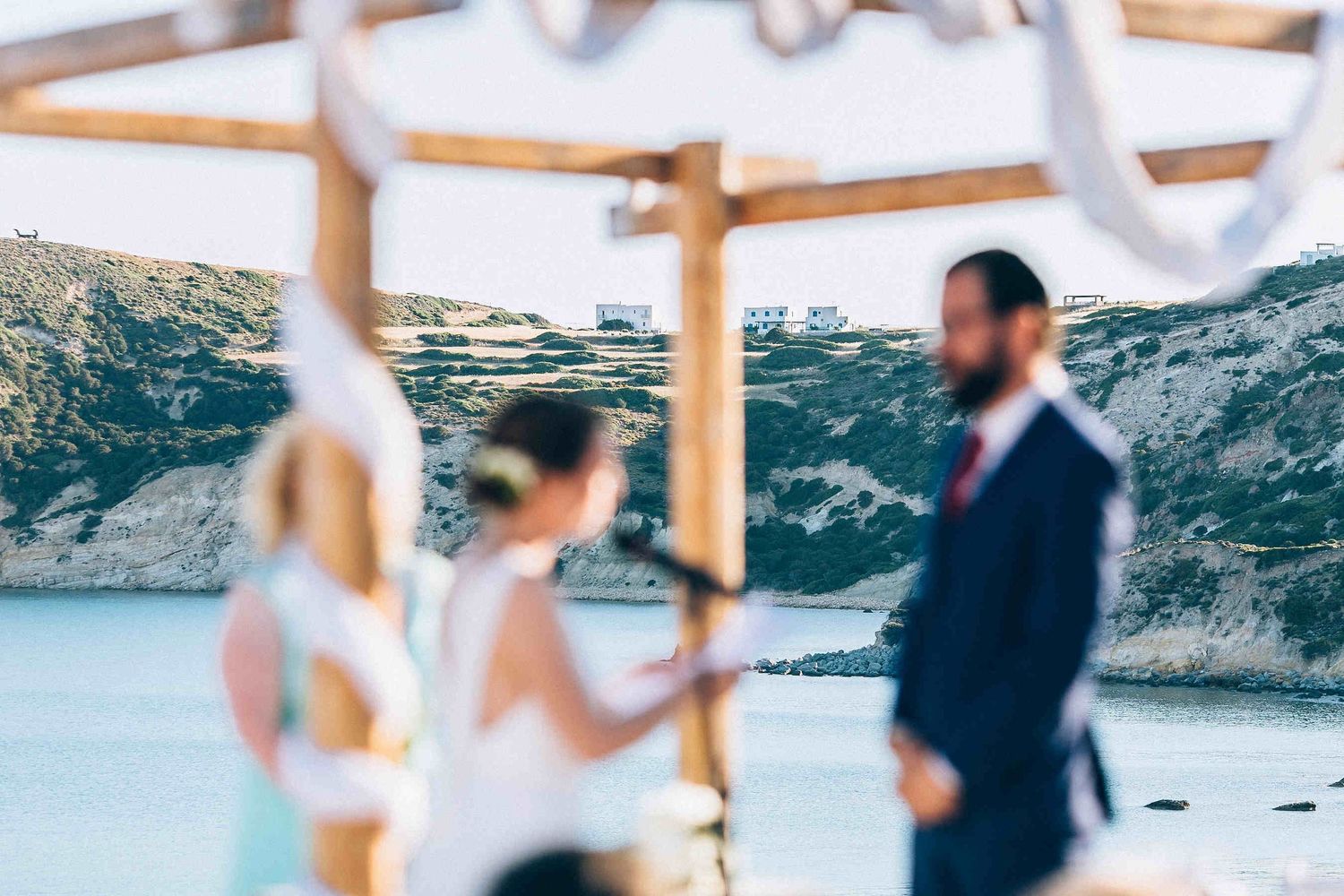The rugged beach and coastline of Milos providing a wild atmosphere for the wedding