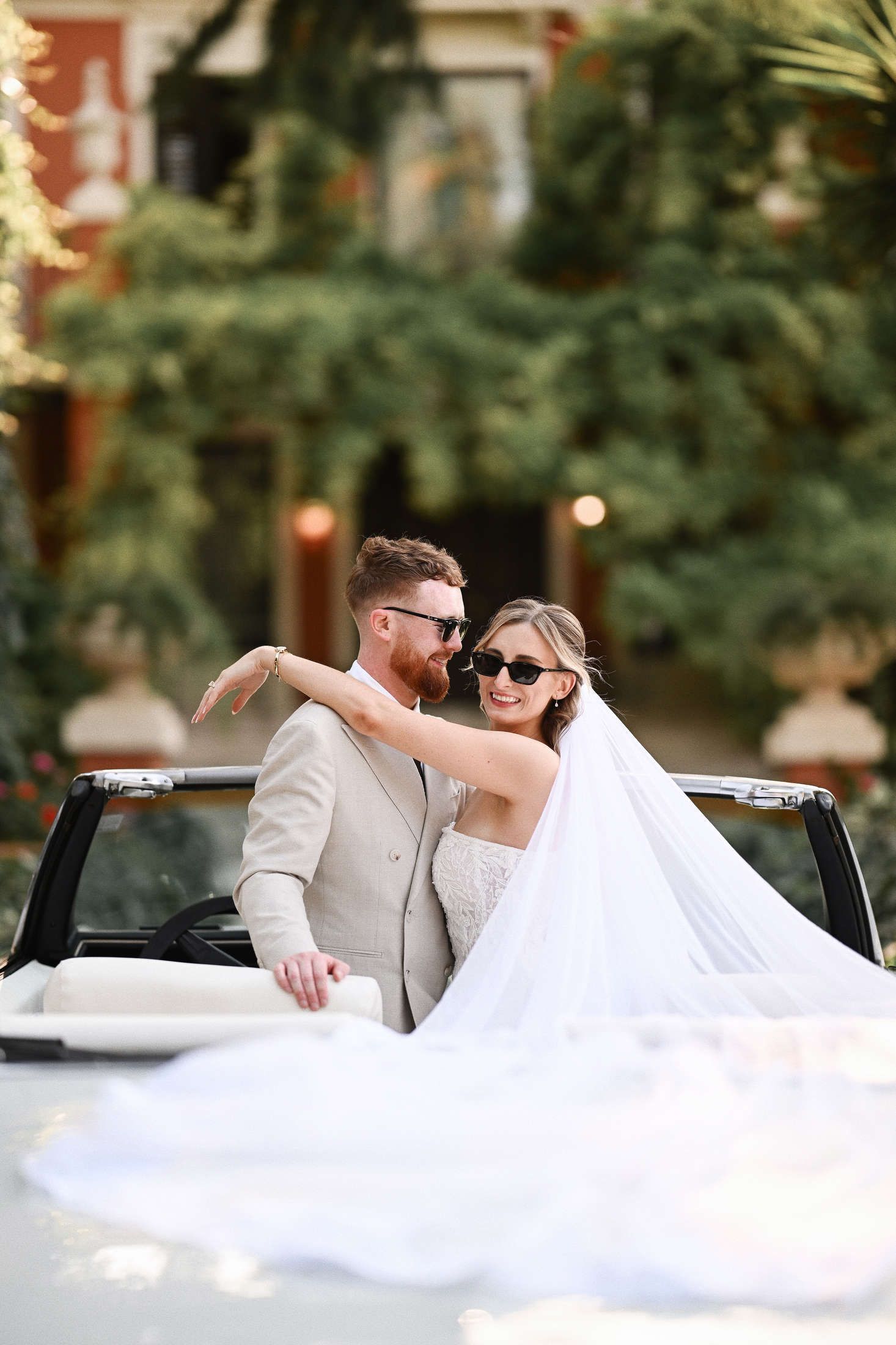 Bride and groom enjoying their destination wedding photoshoot at the beautiful Villa Dela venue in Valencia, Spain.