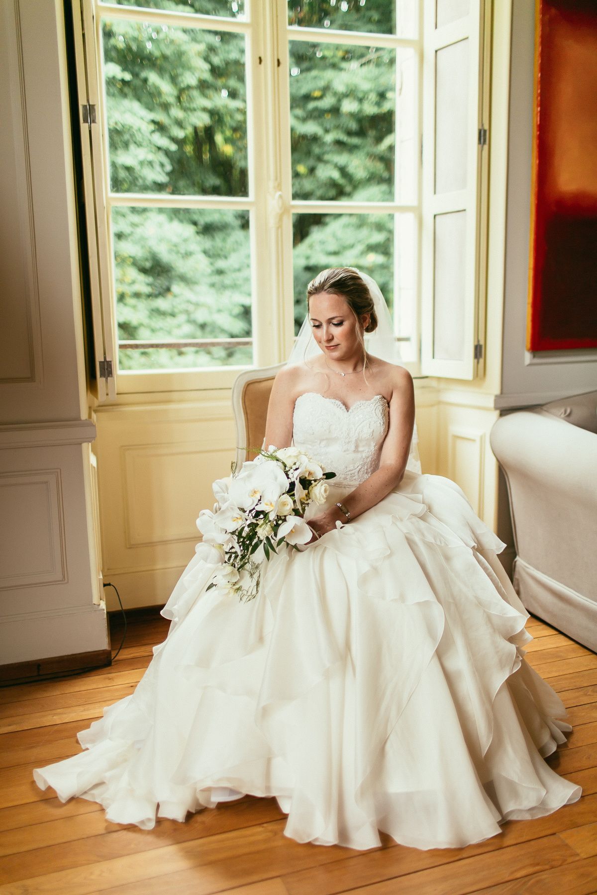 Classic architecture inside Château de Changy. Fashion-forward wedding details in a historic Parisian estate.