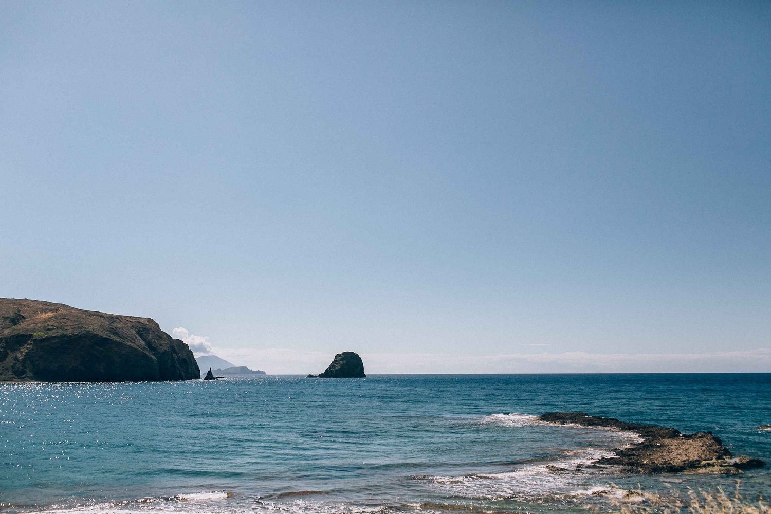 Breathtaking horizon view of the Aegean Sea from the Salt Suites balcony in Milos.