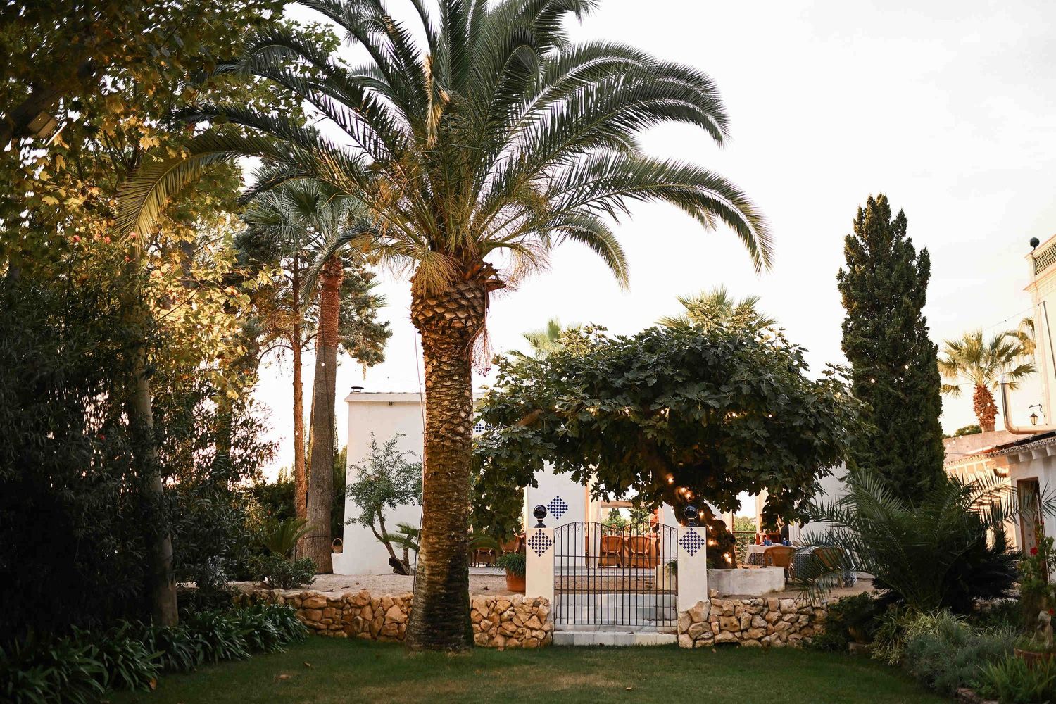 The serene and historic architecture of Villa Paula in Valencia, captured in the soft evening golden hour light