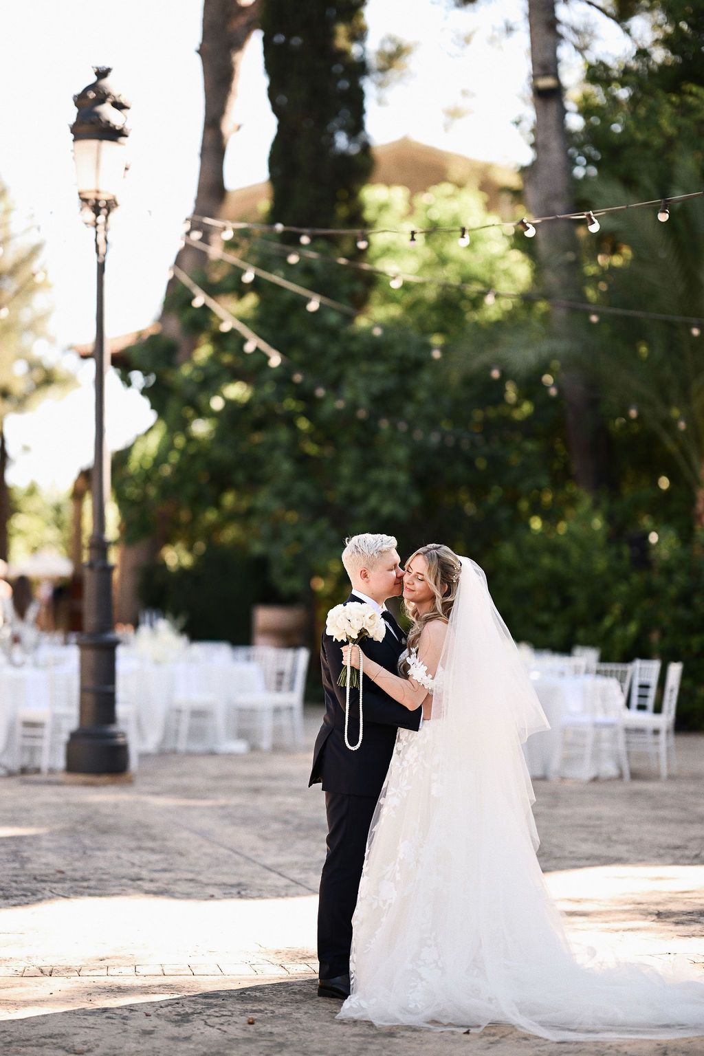 Bride and groom during their romantic wedding photo session on the beautiful historic grounds of Finca El Senyoret in Benidorm.
