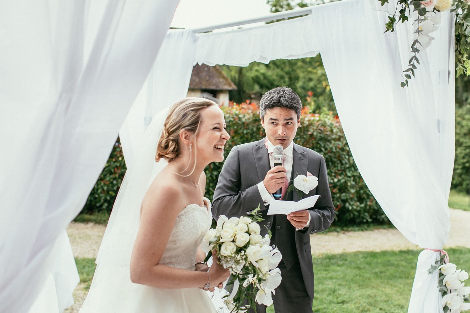 Romantic couple moments after the ceremony at Château de Changy. Elegant movement and genuine emotions.