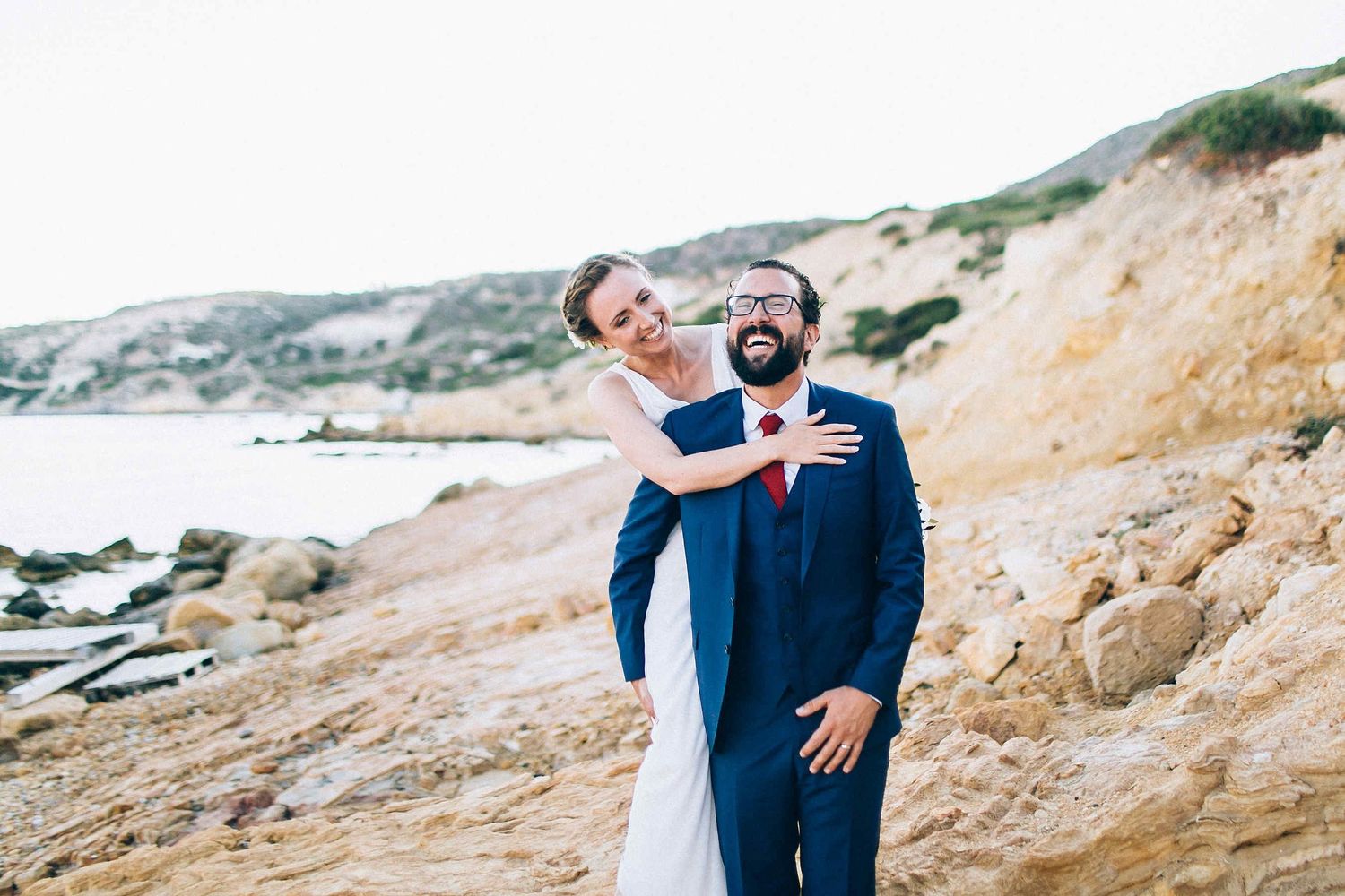 Pure joy and laughter of the couple after their intimate wedding ceremony.