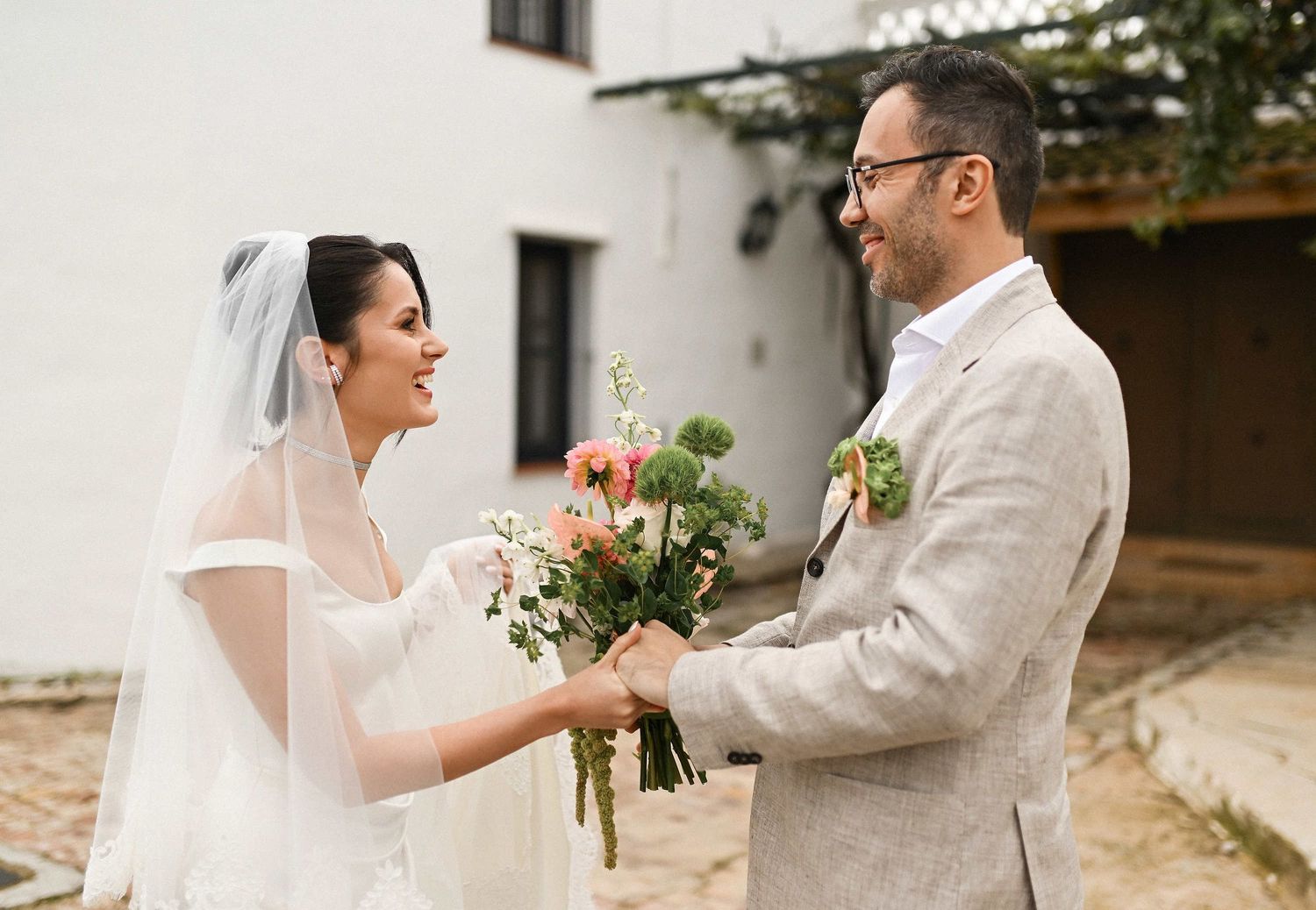 An emotional first look moment between Semih and Maya in the secluded Mediterranean gardens of Villa Paula, Valencia