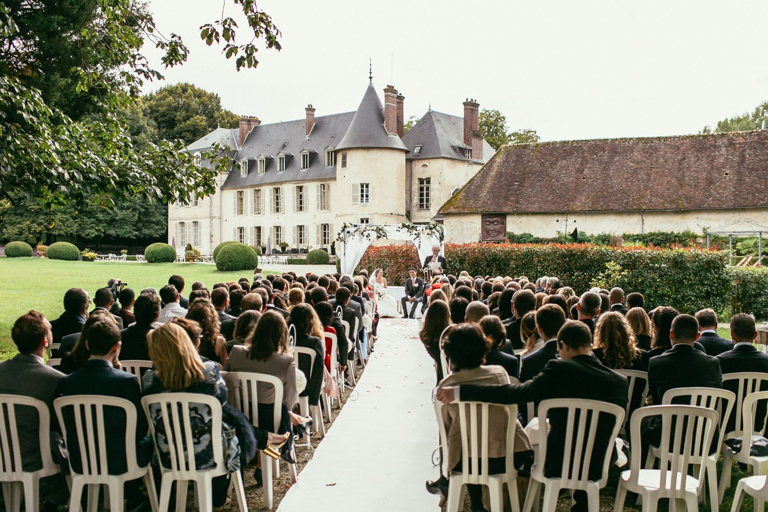 The grand entrance of Château de Changy. Historic French estate aesthetics for an artistic wedding story