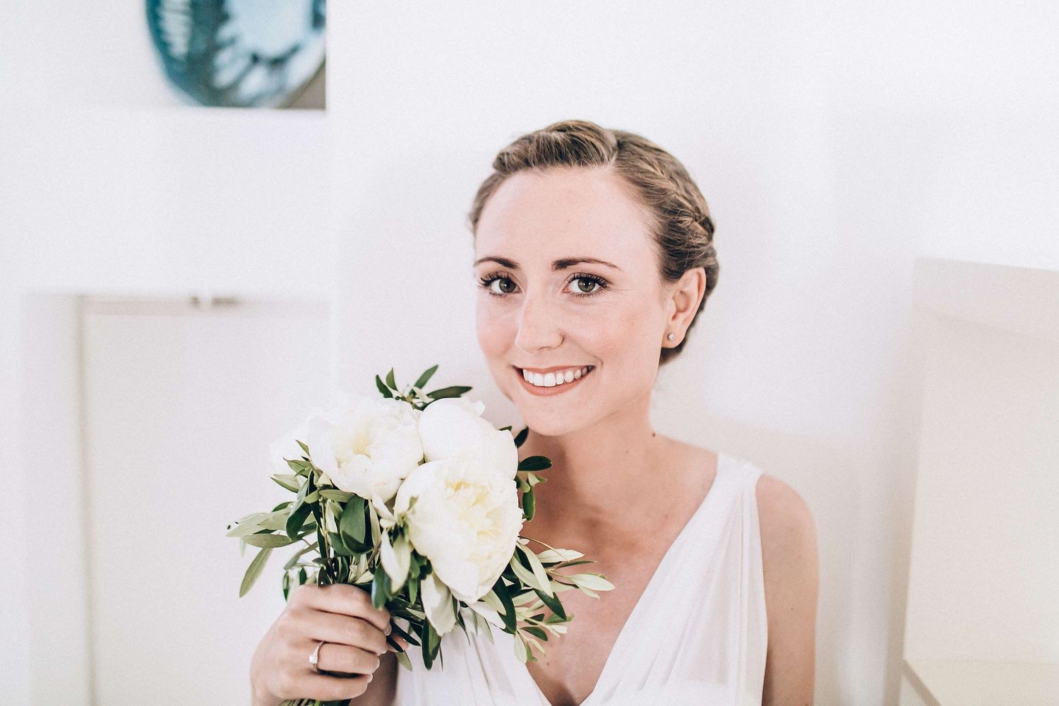 High-end bridal portrait captured in soft natural light at a private villa in Milos