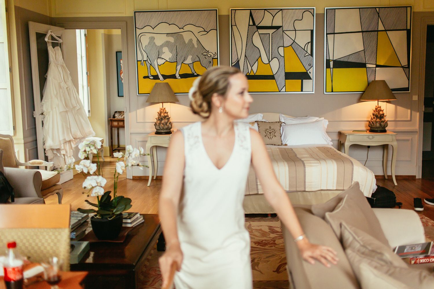Bridal preparation in a luxury suite at Château de Changy. High-fashion wedding style and soft cinematic light