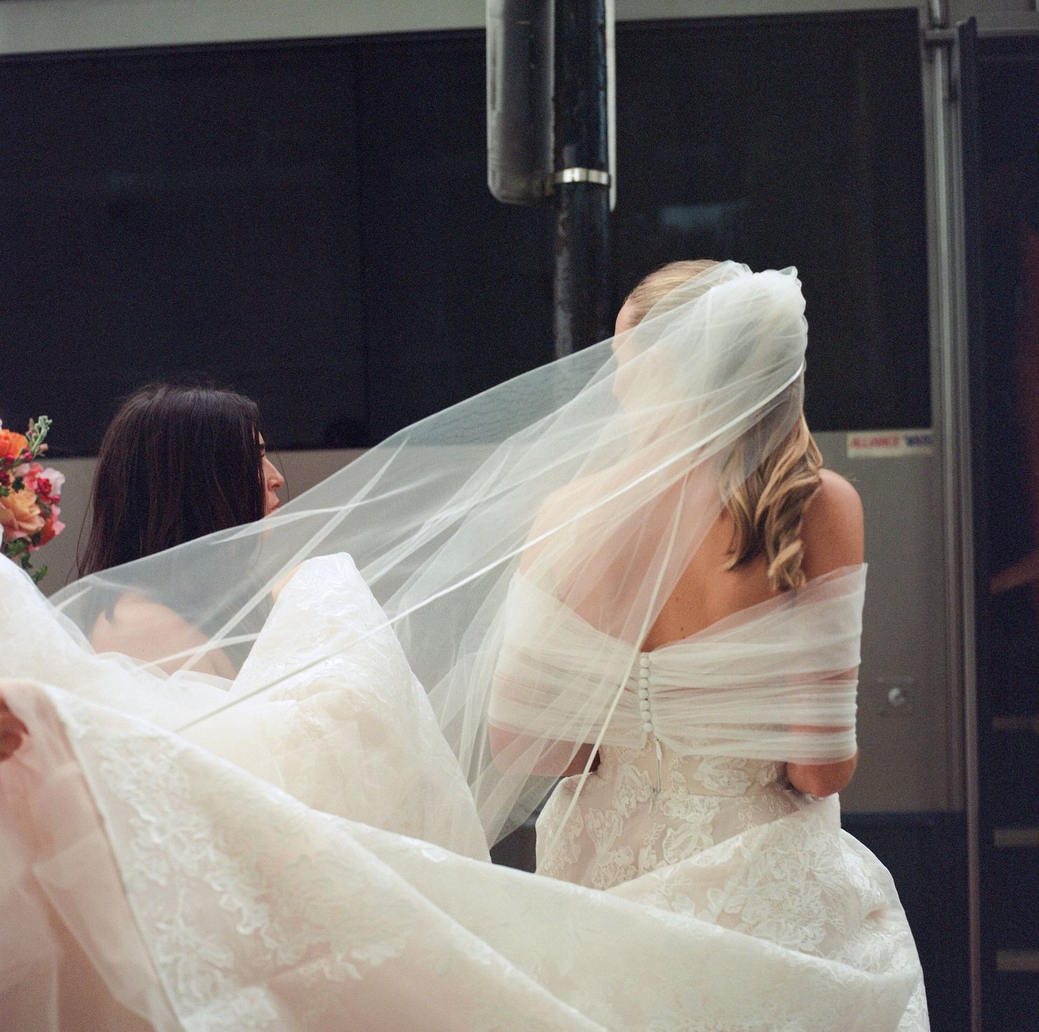 A flowing white wedding veil catches the breeze in a series of artistic photographs.