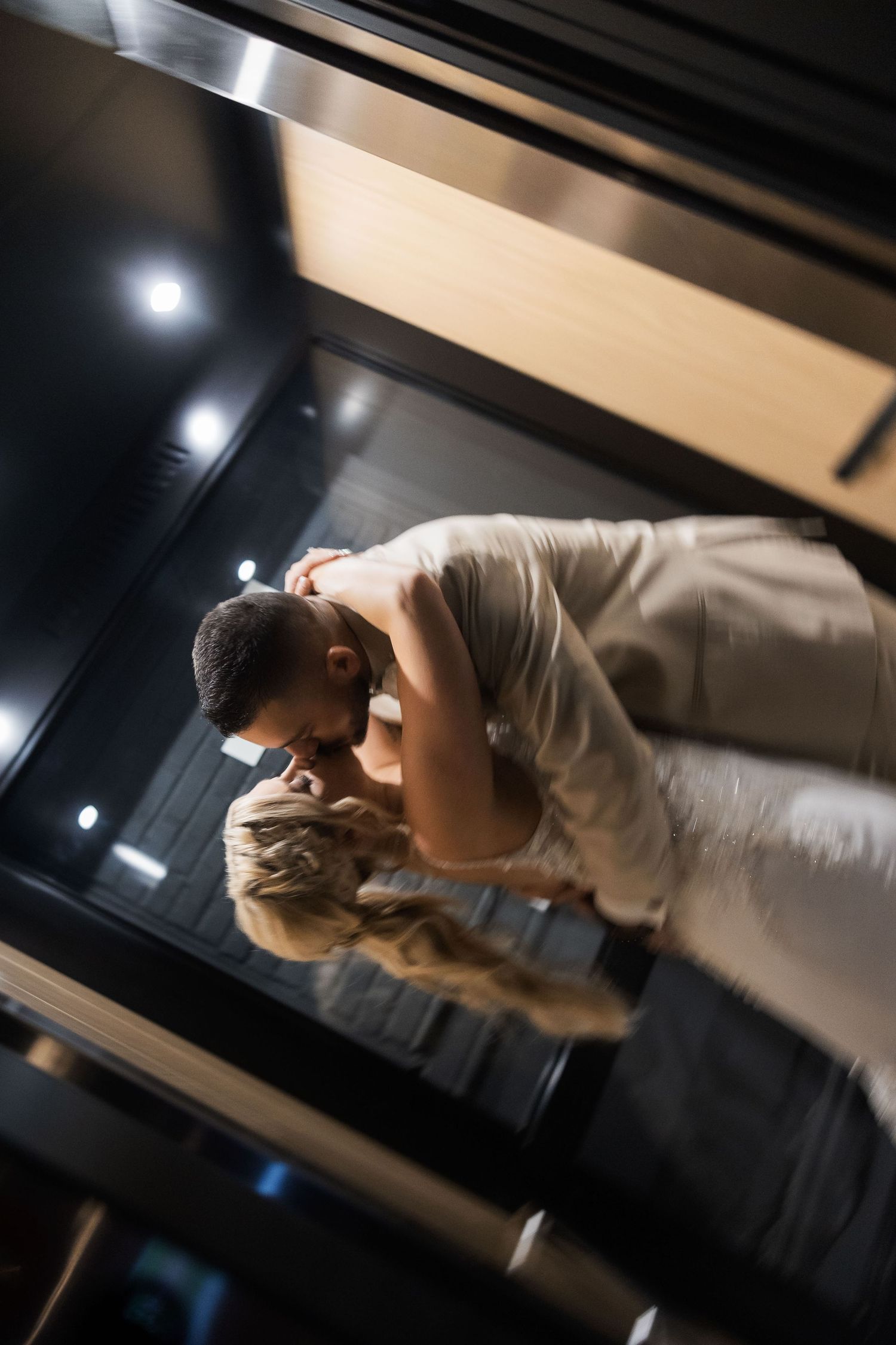 Artistic overhead shot of a couple's first dance at their wedding reception.