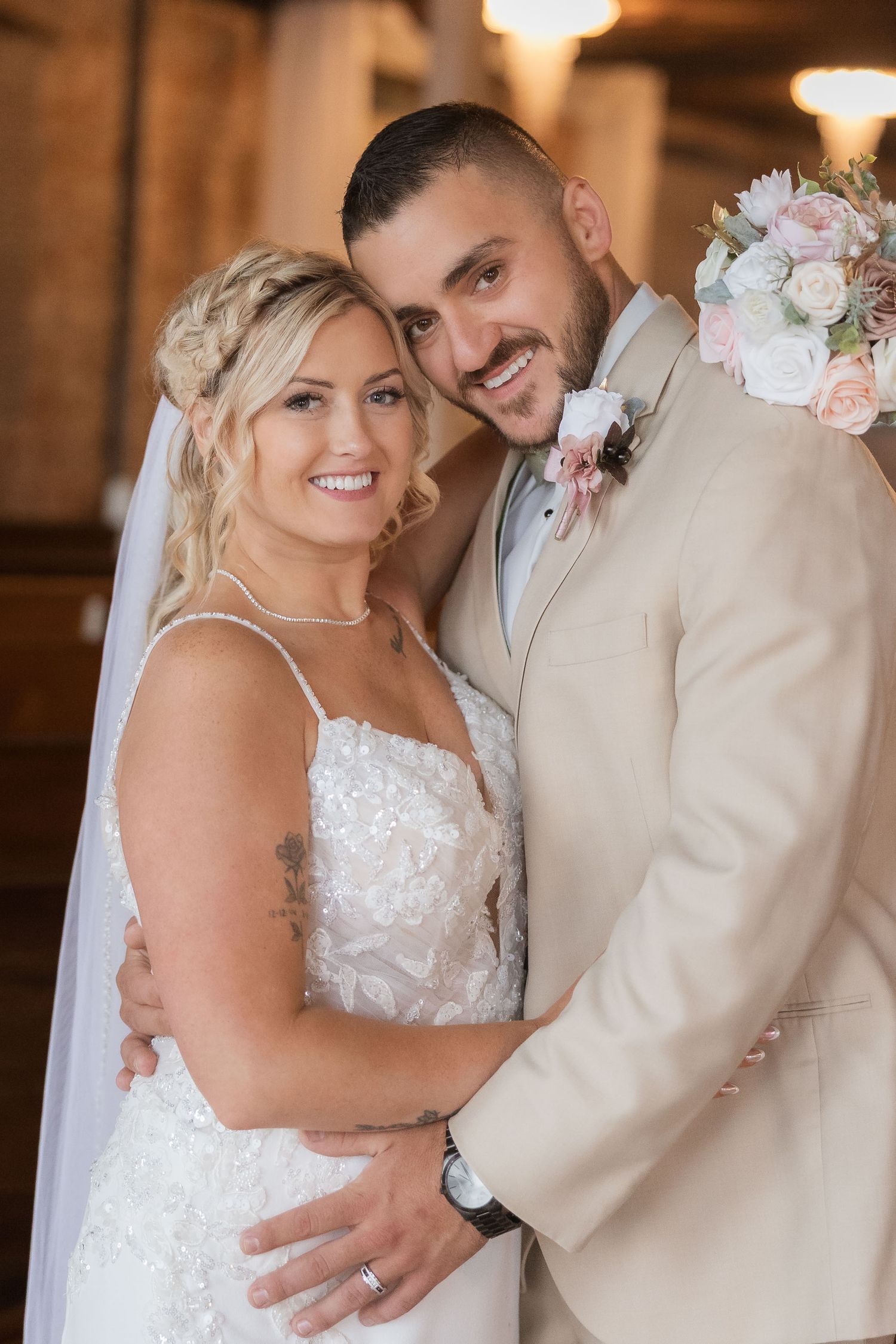Romantic wedding couple in a rustic indoor setting sharing intimate moments in a series of photos.