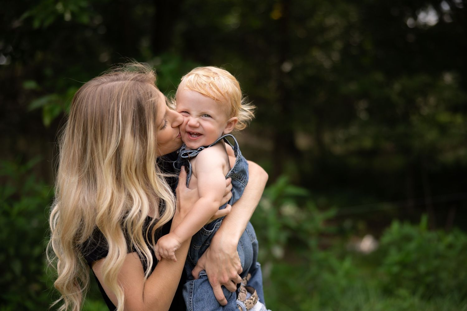 Sweet candid moments between parent and child outdoors.