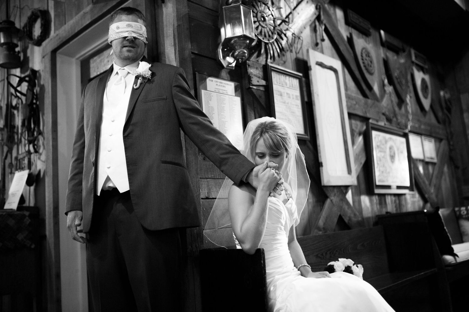 Black and white artistic wedding portraits in dramatic lighting and shadows.