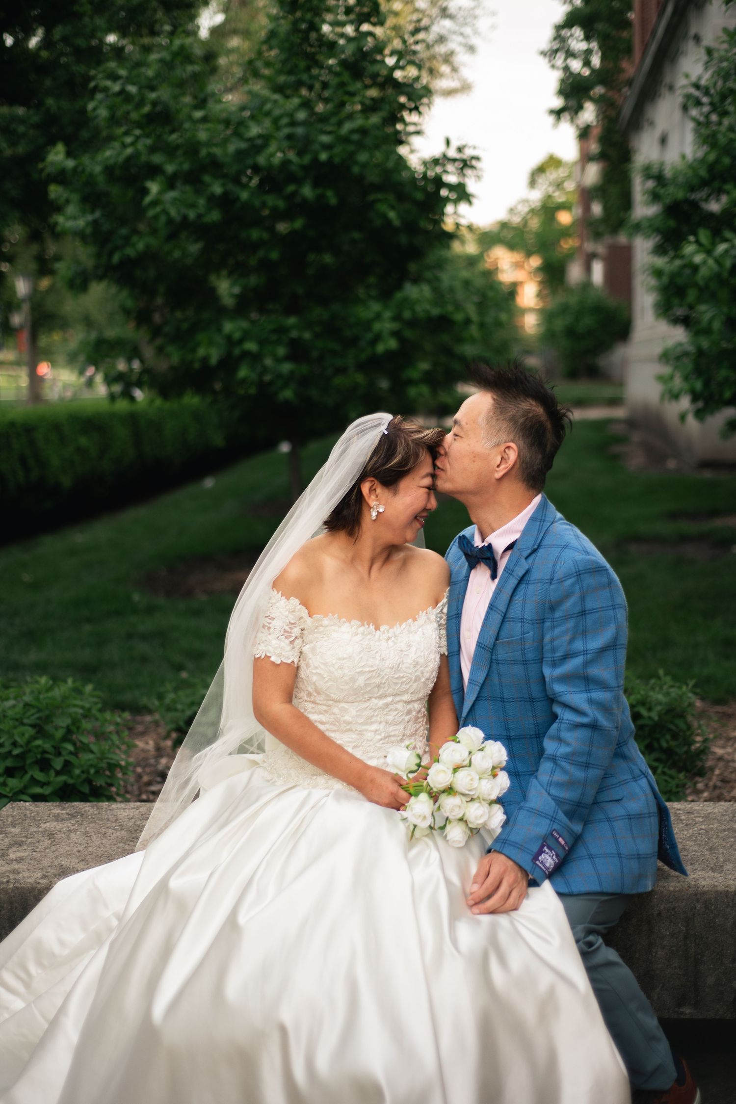 Cinematic wedding style anniversary photo of couple at University of Illinois Urbana Champaign main quad by Urbana Ever After Photography