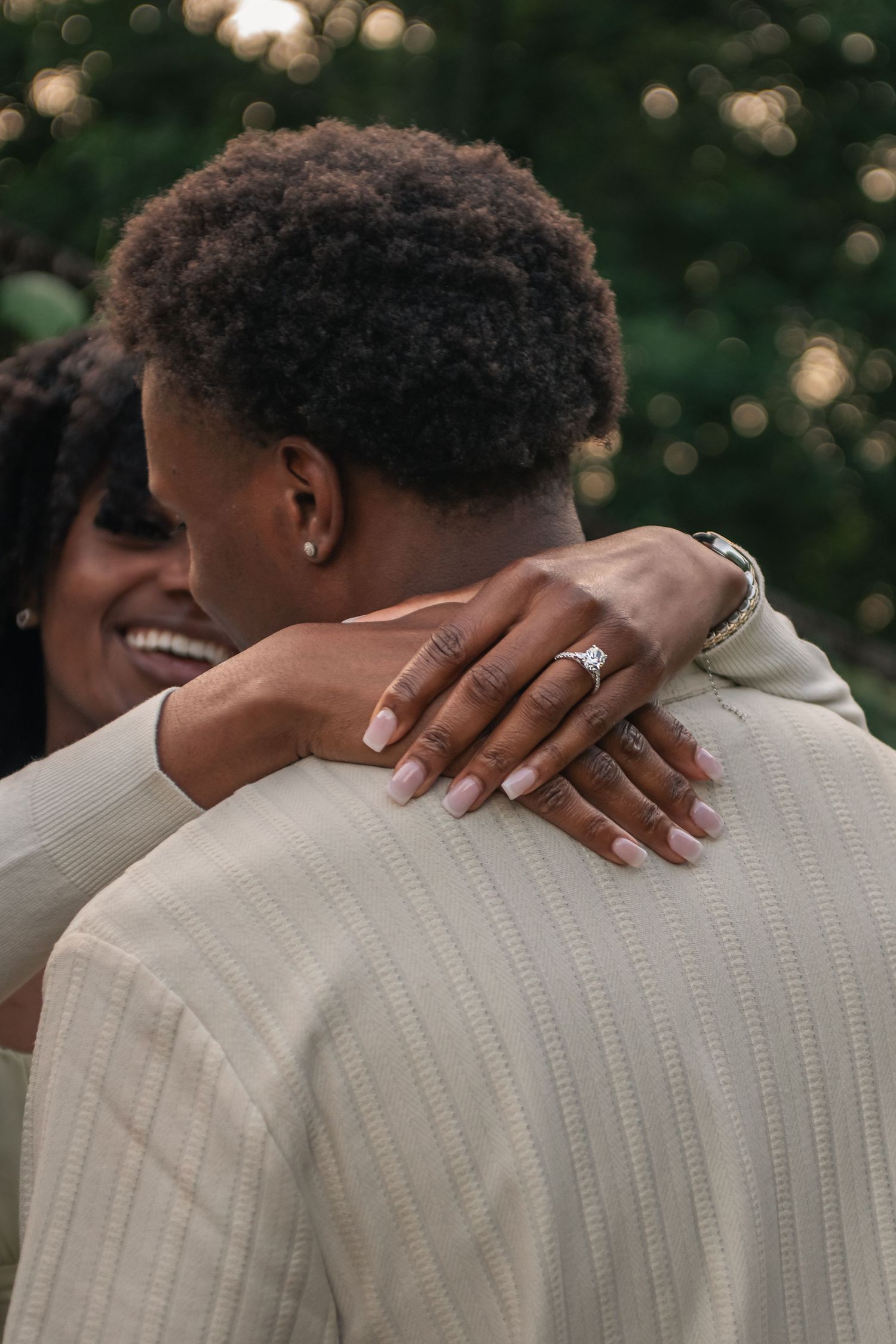 cinematic golden hour engagement photo ring close up at Allerton Park and Retreat Center in Monticello IL by Urbana Ever After Photography