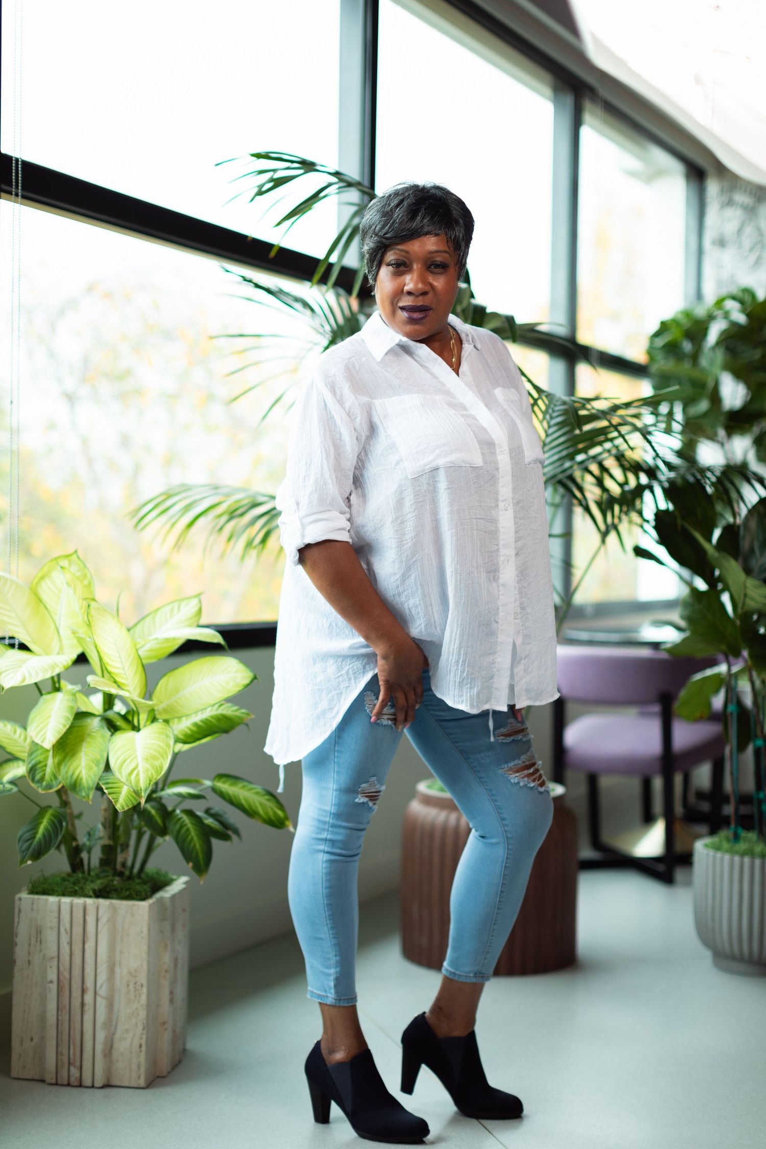 Full body shots showing casual style with white shirt and light denim.