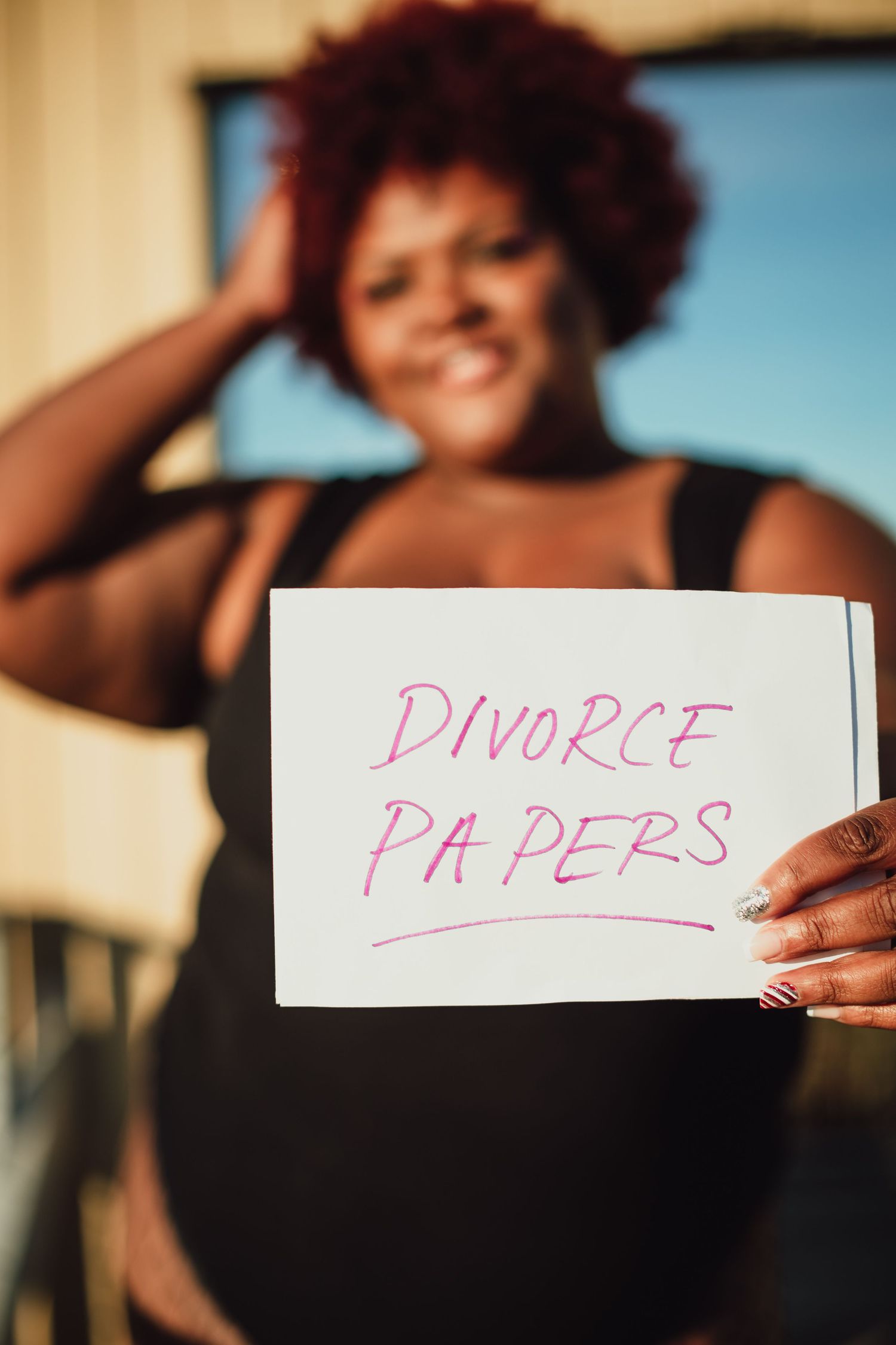 A series of photos showing hands holding papers with text in pink writing.