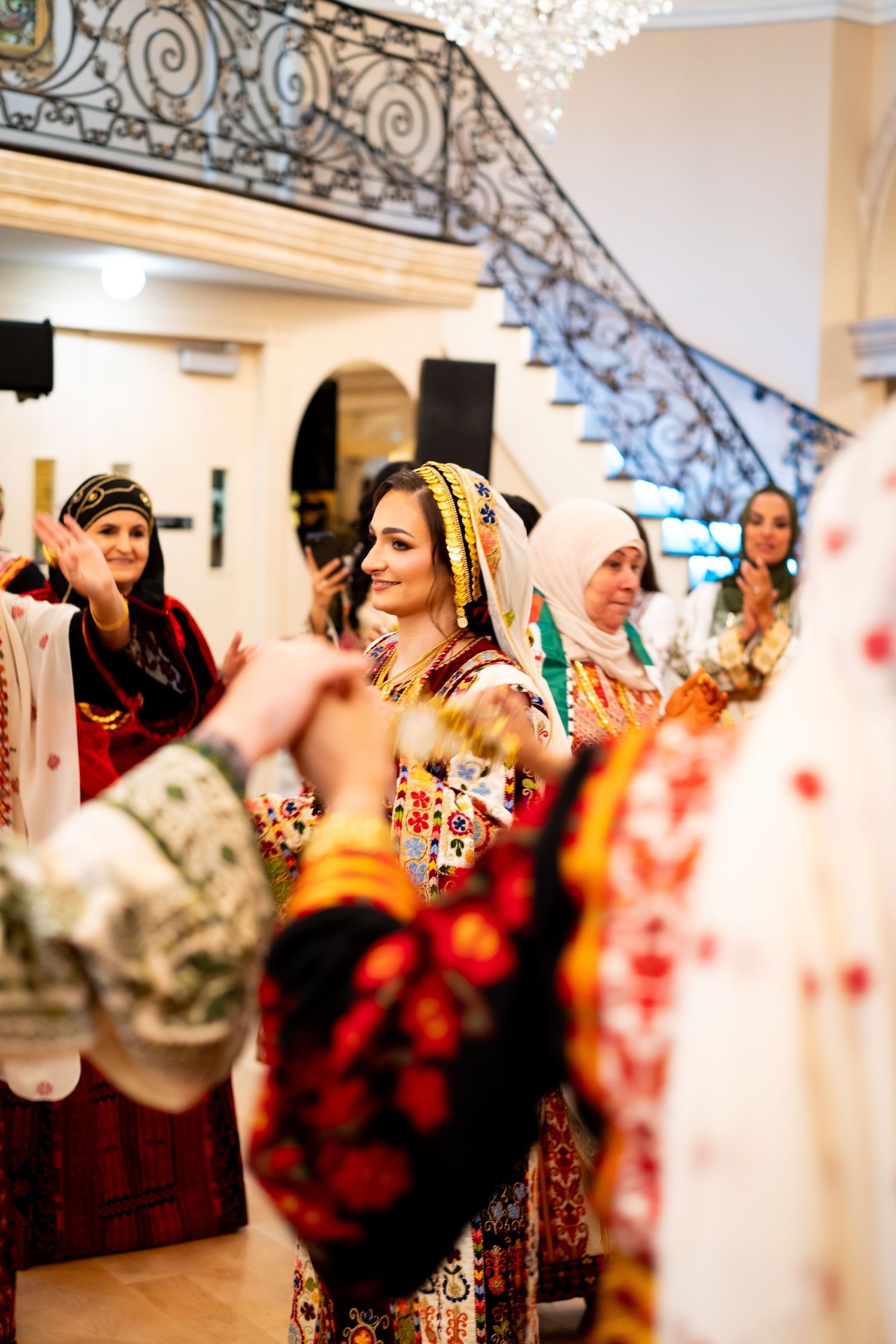 Traditional cultural celebration with colorful traditional clothing and decorative elements.