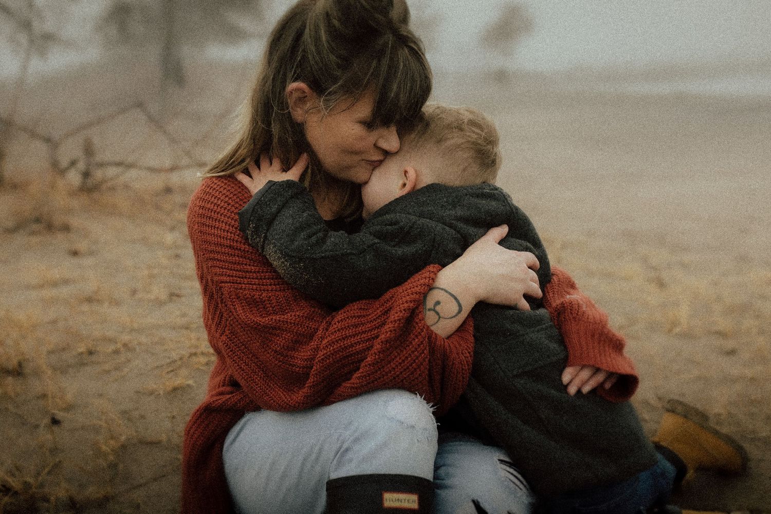 Motherhood session on a foggy beach in Bowmanville